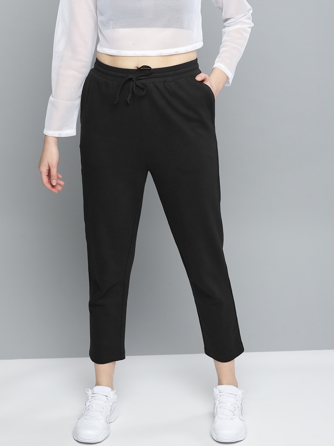

Besiva Women Black Solid Track Pants