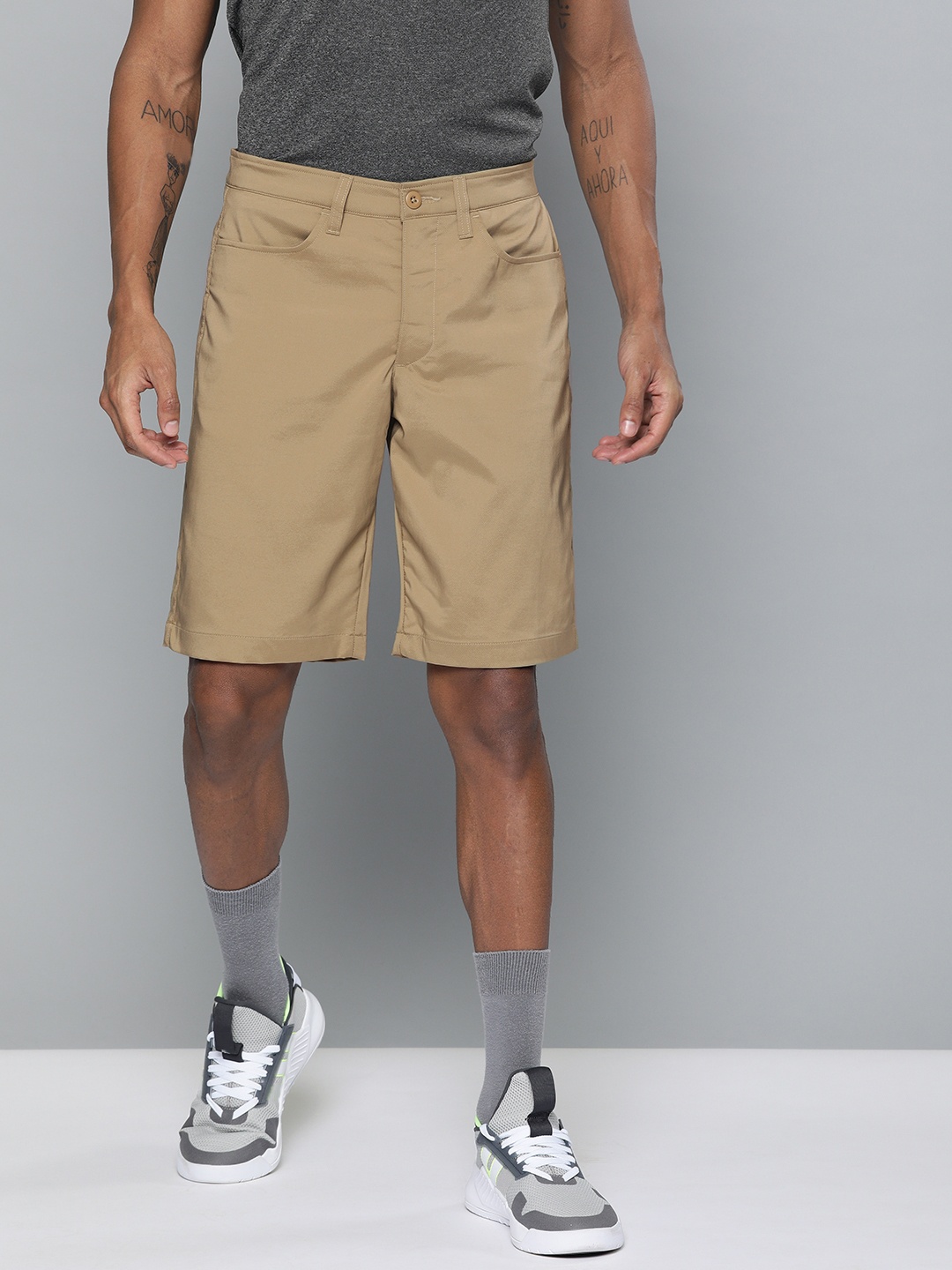 

UNDER ARMOUR Men Beige Solid Regular Fit Regular Shorts