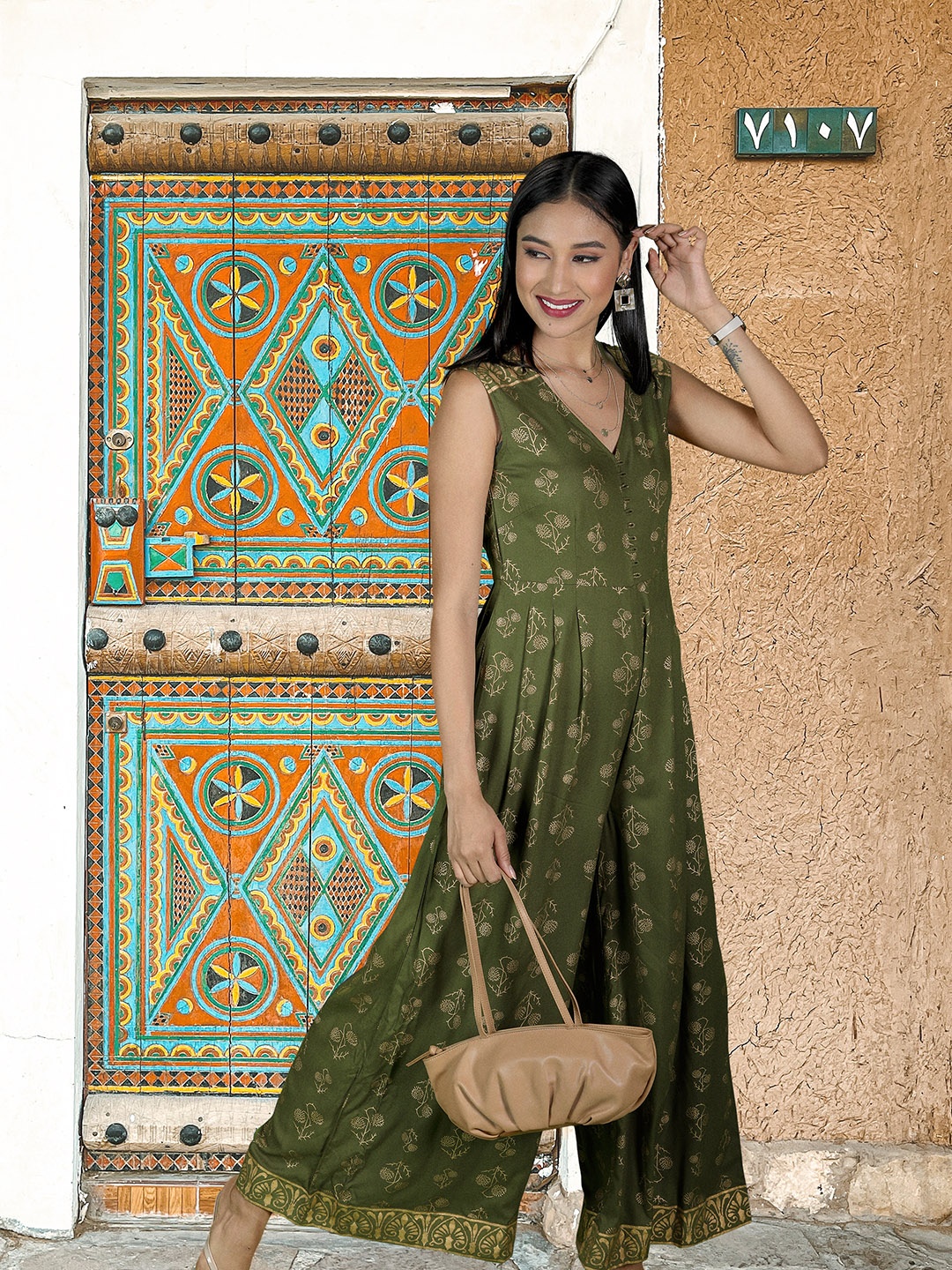 

MABISH by Sonal Jain Women Green & Golden Printed Basic Jumpsuit