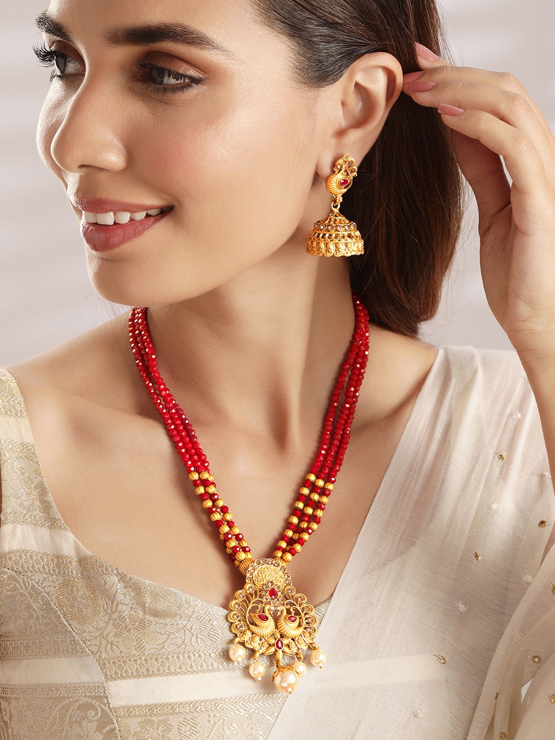 

Rubans Women Gold Plated & Red Ruby Studded Peacock jewellery Set