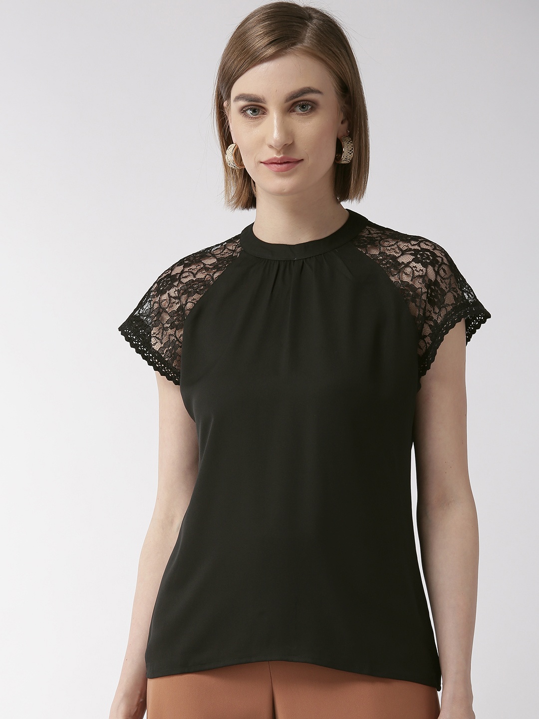 

Style Quotient Women Black Solid Regular Top