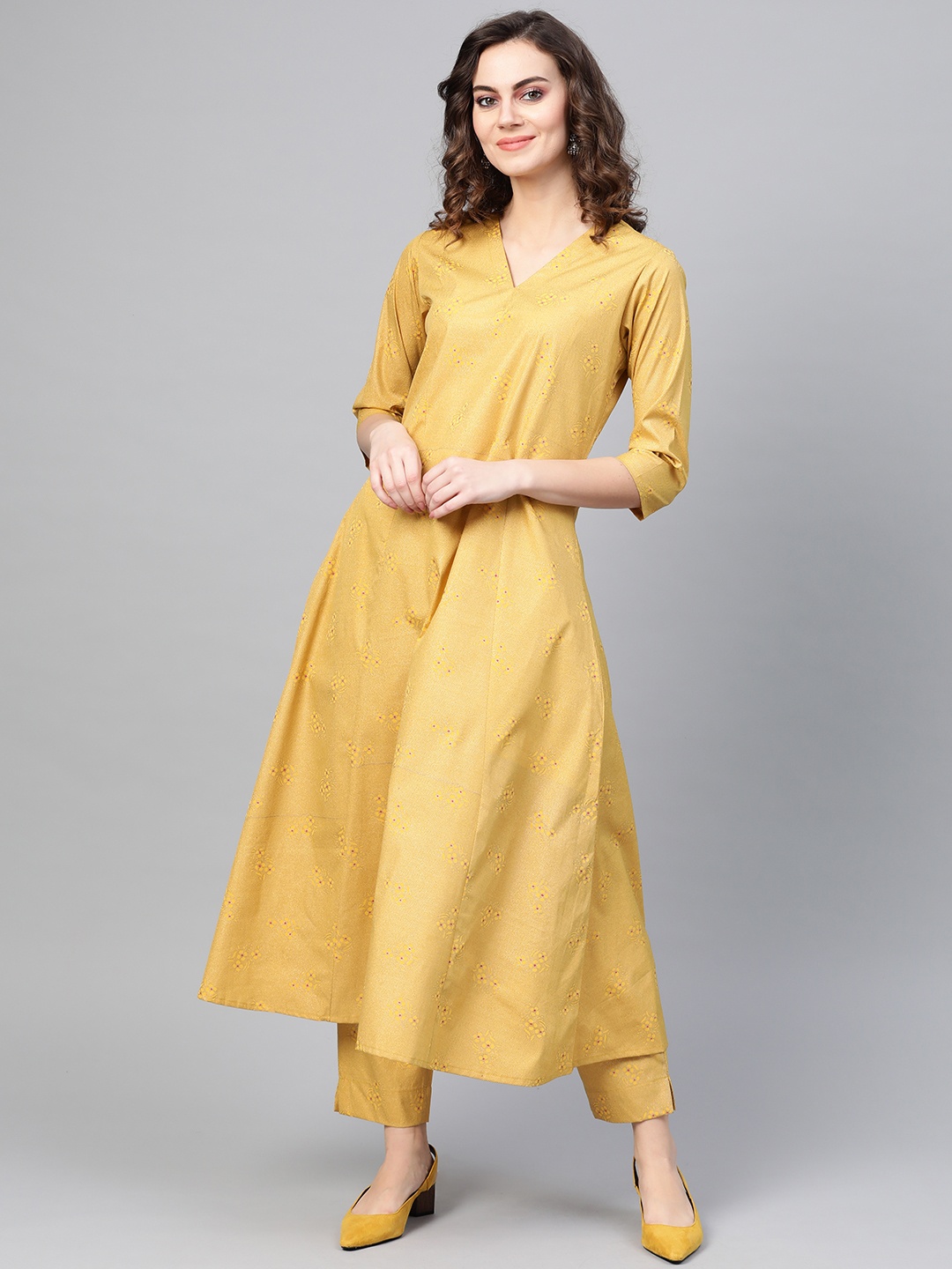 

Ahalyaa Women Mustard Yellow & Golden Printed Kurta with Trousers