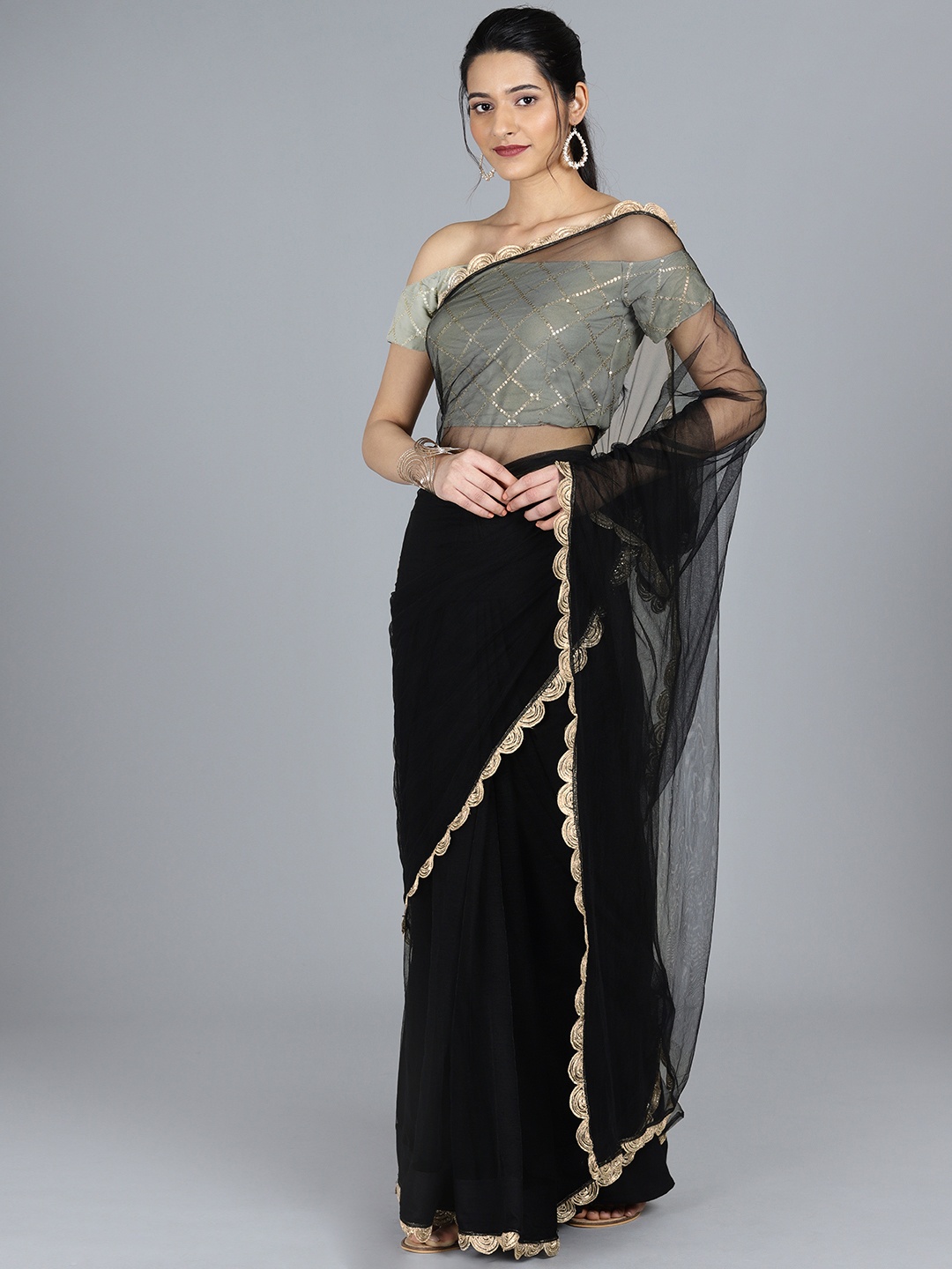 

Ethnovog Black Grey Net Solid Saree With Stitched Blouse