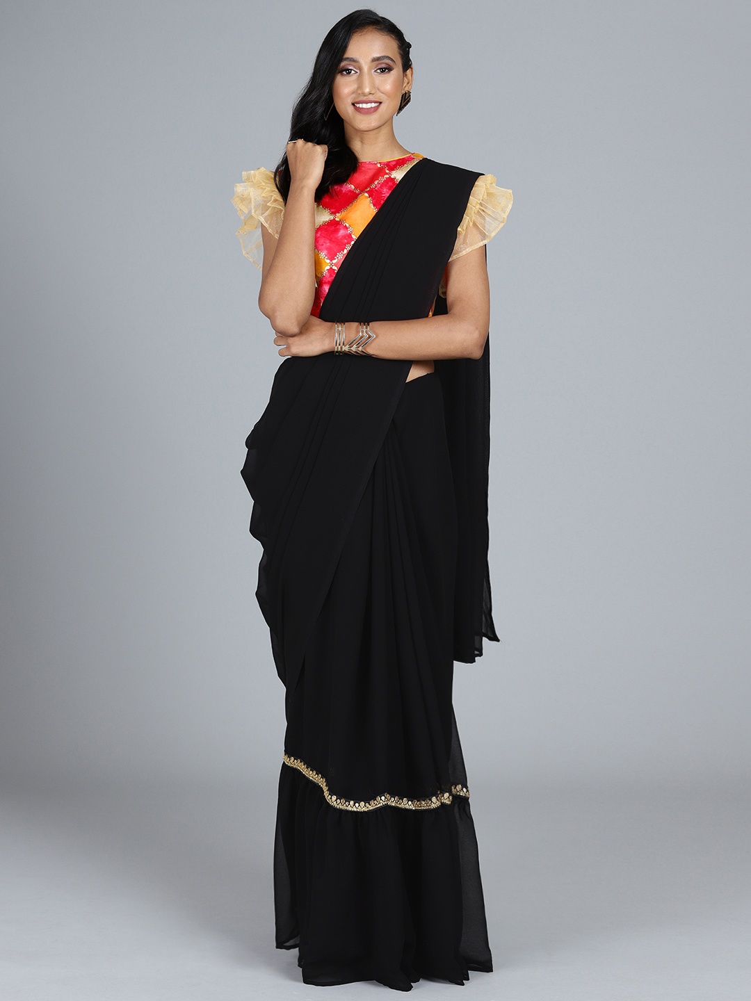 

Ethnovog Black Solid Poly Georgette Saree with Stitched Blouse