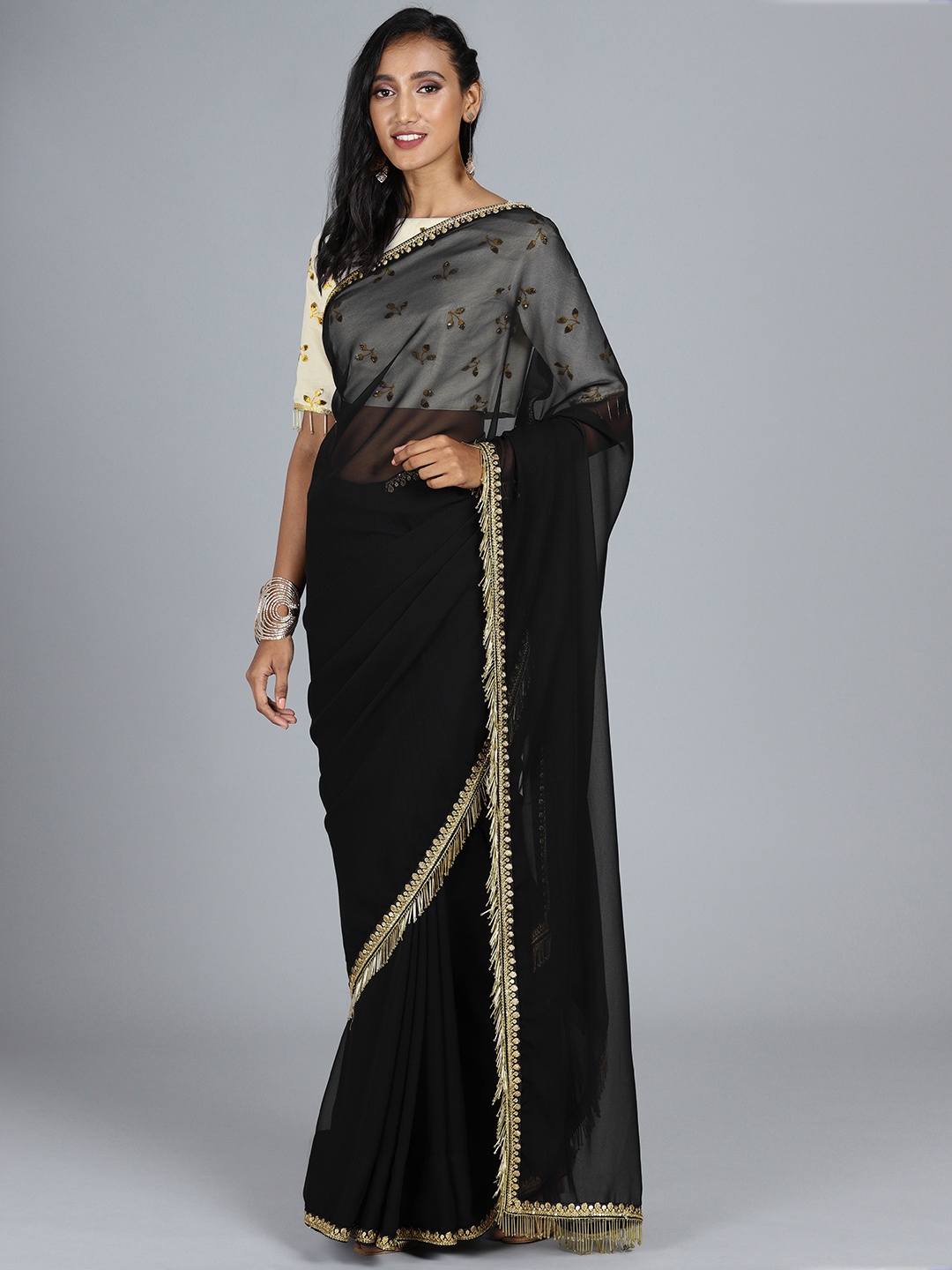 

Ethnovog Black Off-White Poly Georgette Solid Saree