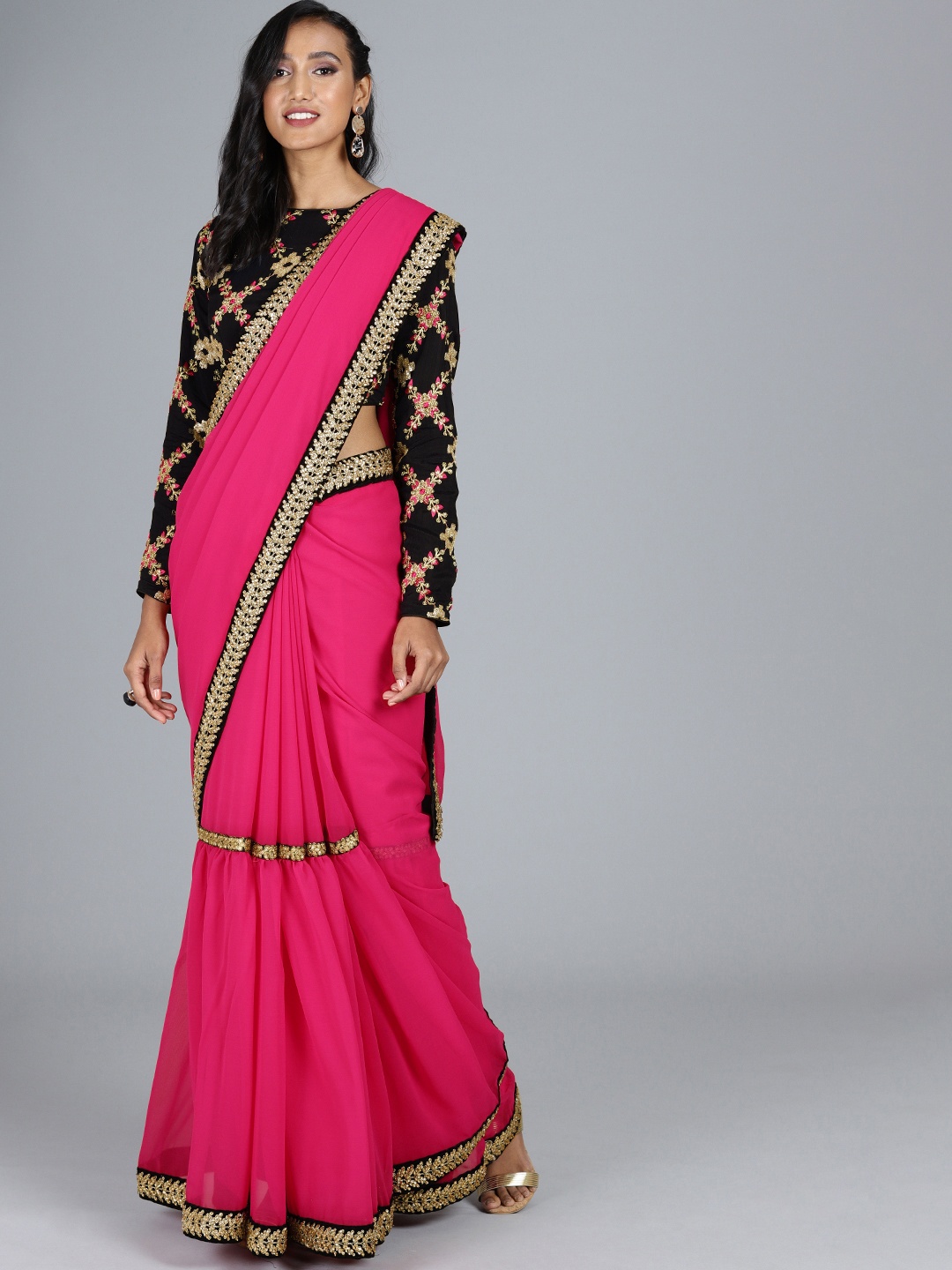 

Ethnovog Pink Black Poly Georgette Solid Saree