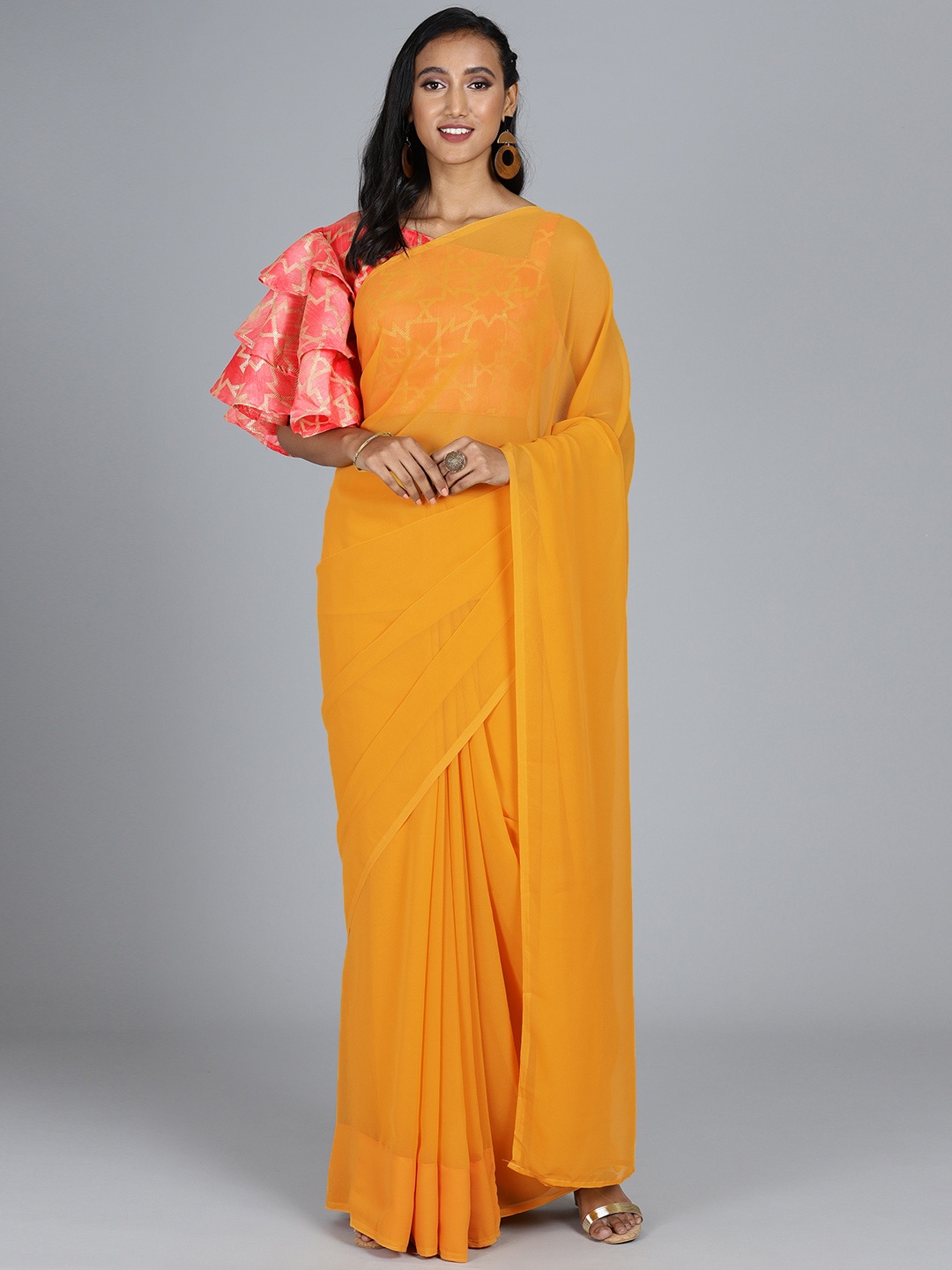 

Ethnovog Mustard Yellow Solid Poly Georgette Saree Stitched Blouse