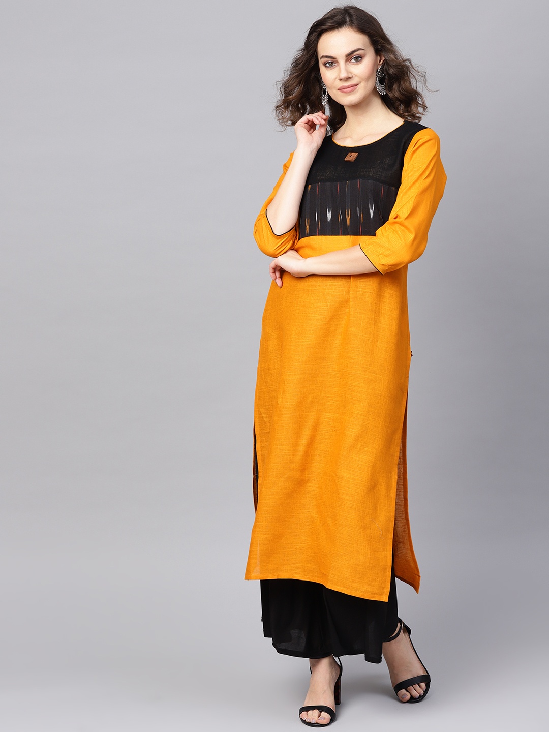

KSUT Women Mustard Yellow & Black Ikat Yoke Design Straight Kurta