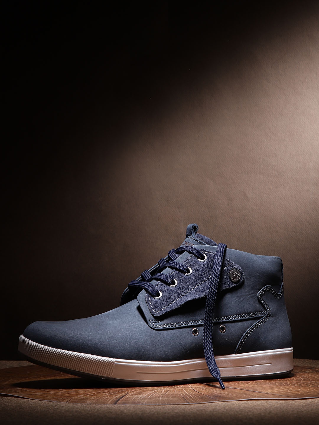 

Red Chief Men Navy Blue Solid Leather Mid-Top Sneakers