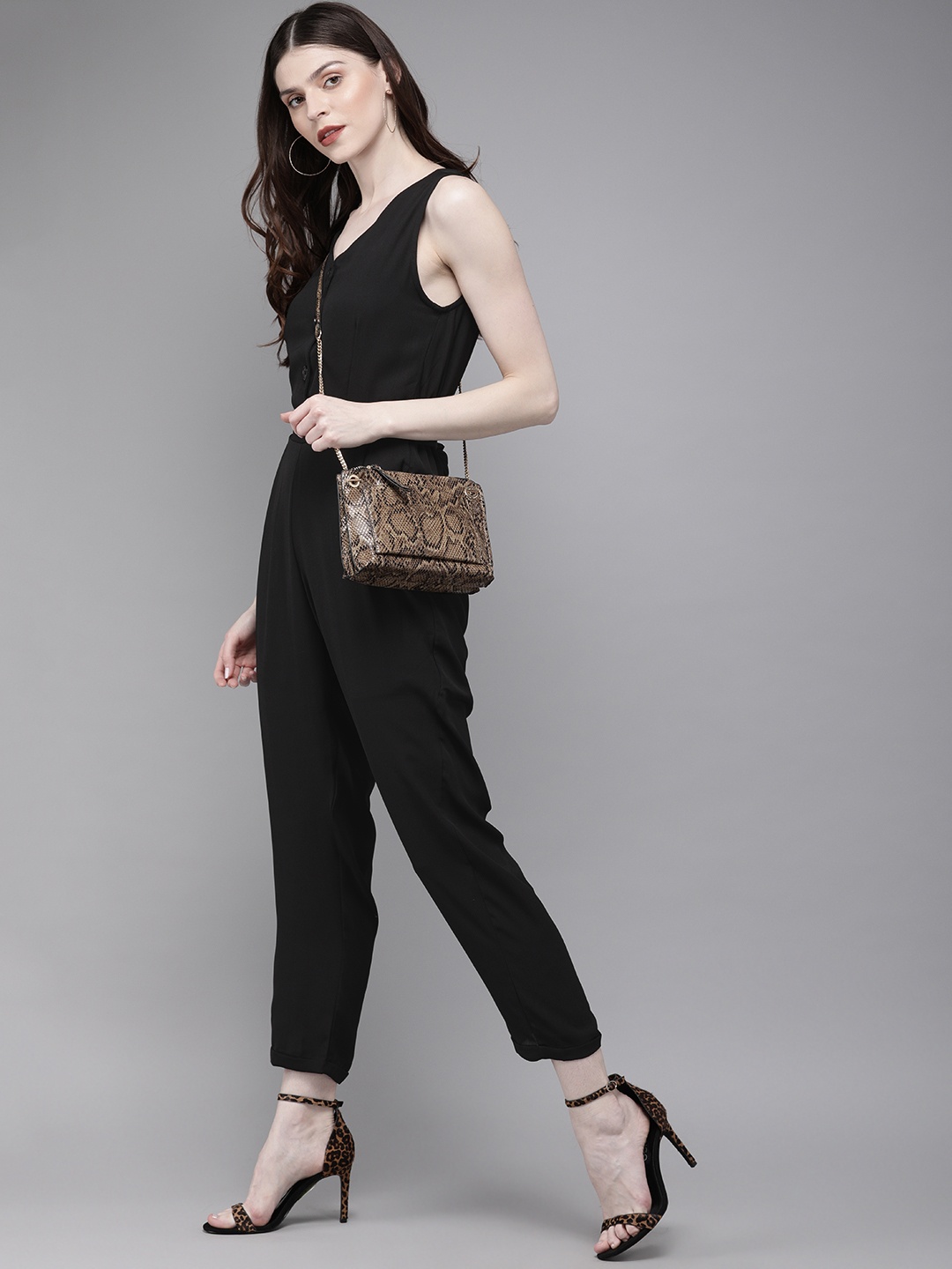 

SASSAFRAS Women Black Solid Tapered Fit Basic Jumpsuit With Tie-Up Detailing
