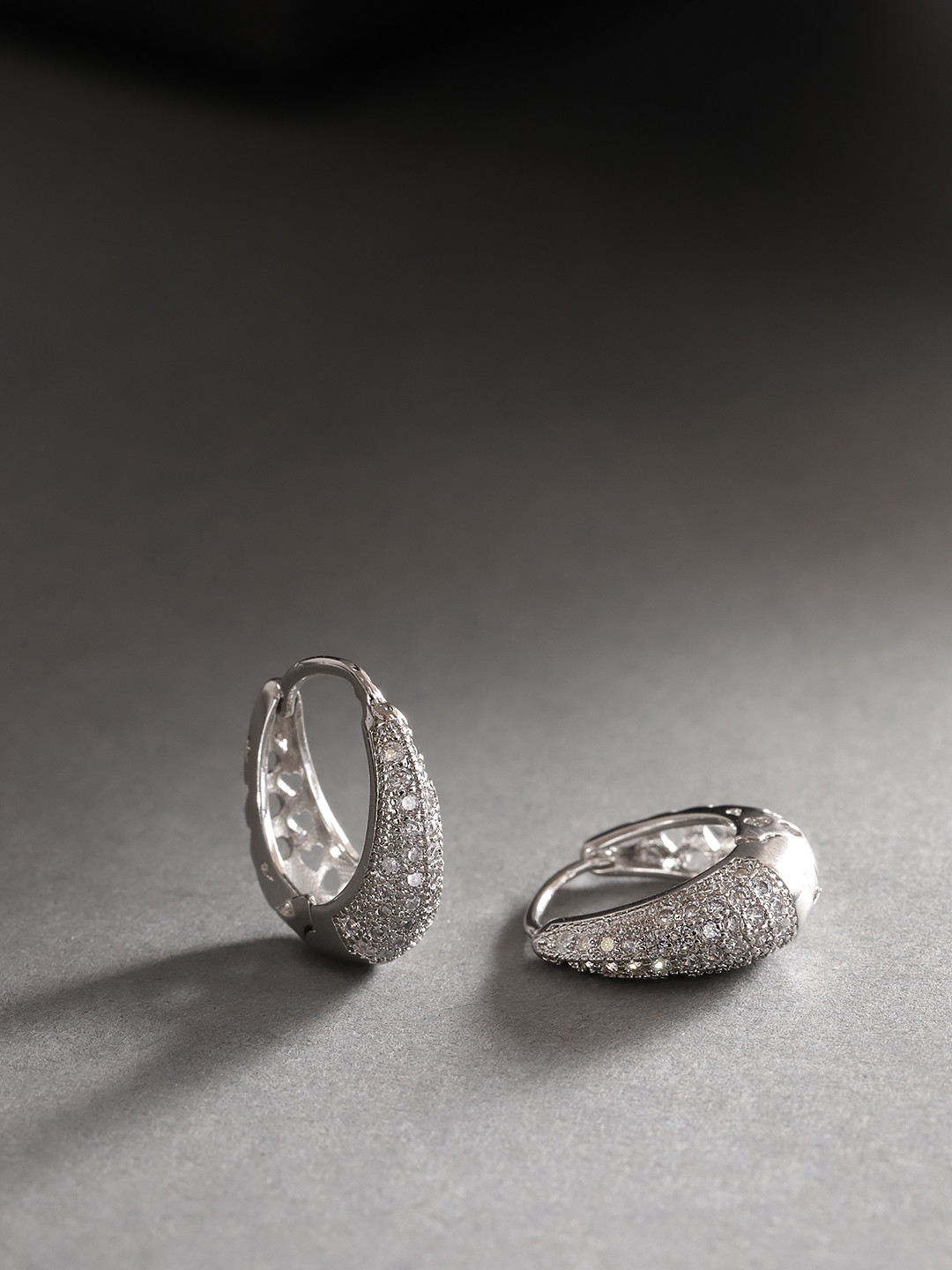 

Jewels Galaxy Silver-Plated Stone Studded Circular Hoop Earrings