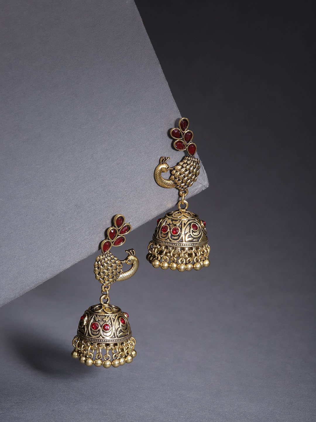 

Jewels Galaxy Burgundy Antique Gold-Plated Stone-Studded Textured Dome Shaped Jhumkas