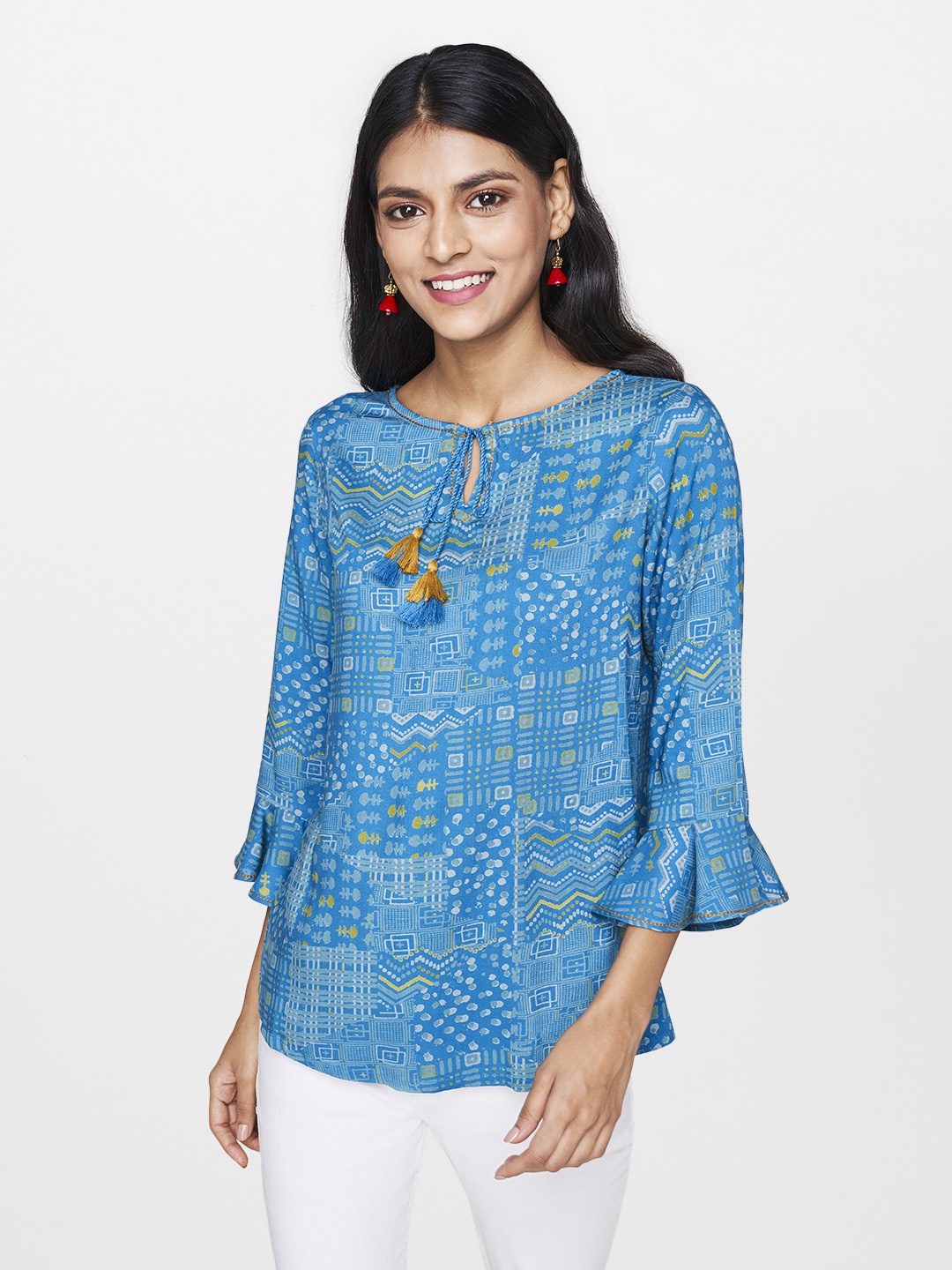 

Global Desi Women Blue Printed Top With Tie-Up Neck
