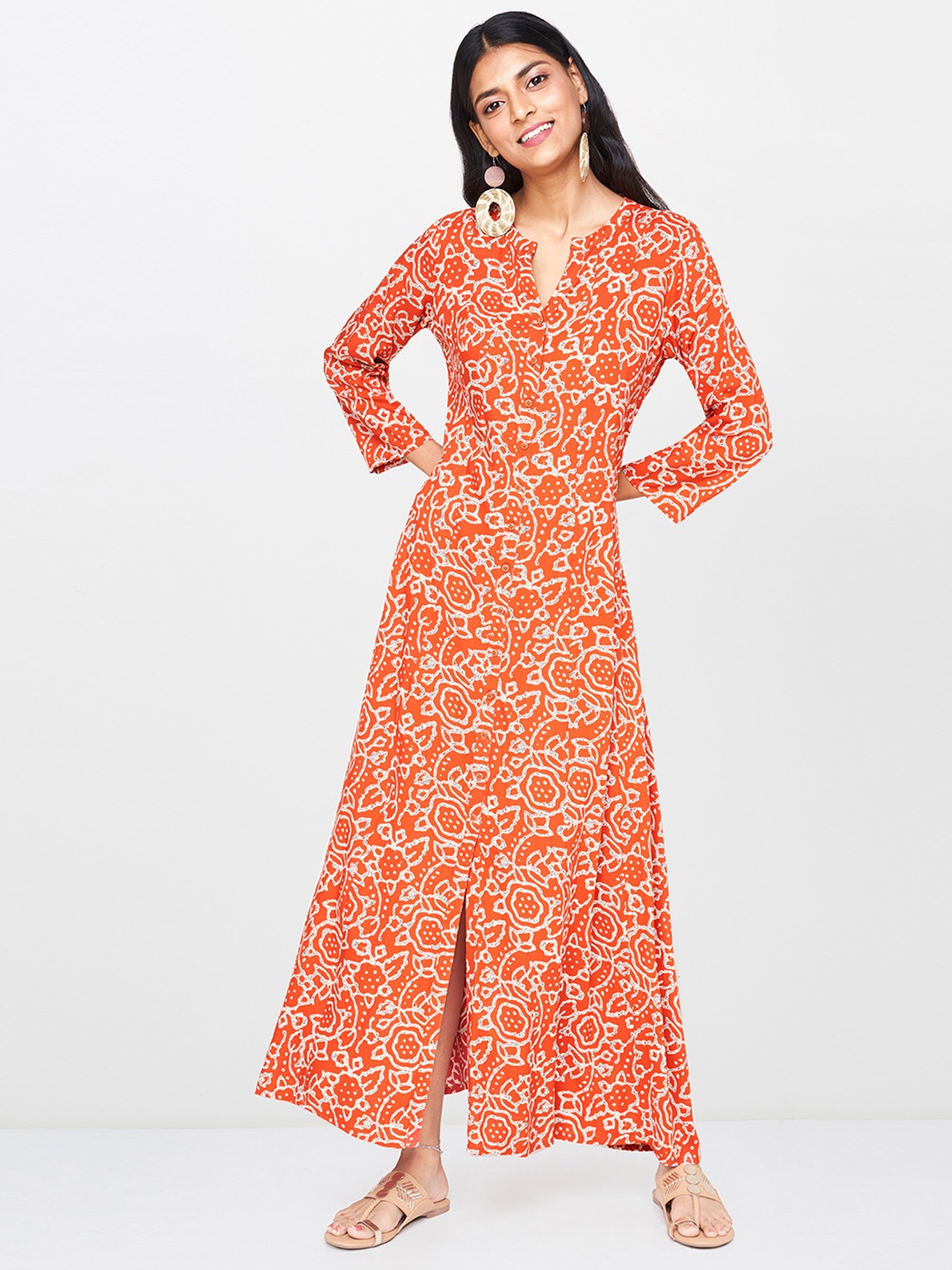 

Global Desi Women Rust Orange & Beige Printed Fit and Flare Dress