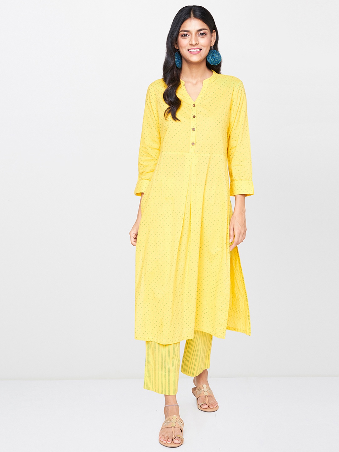 

Global Desi Women Yellow & Green Printed Kurta with Trousers