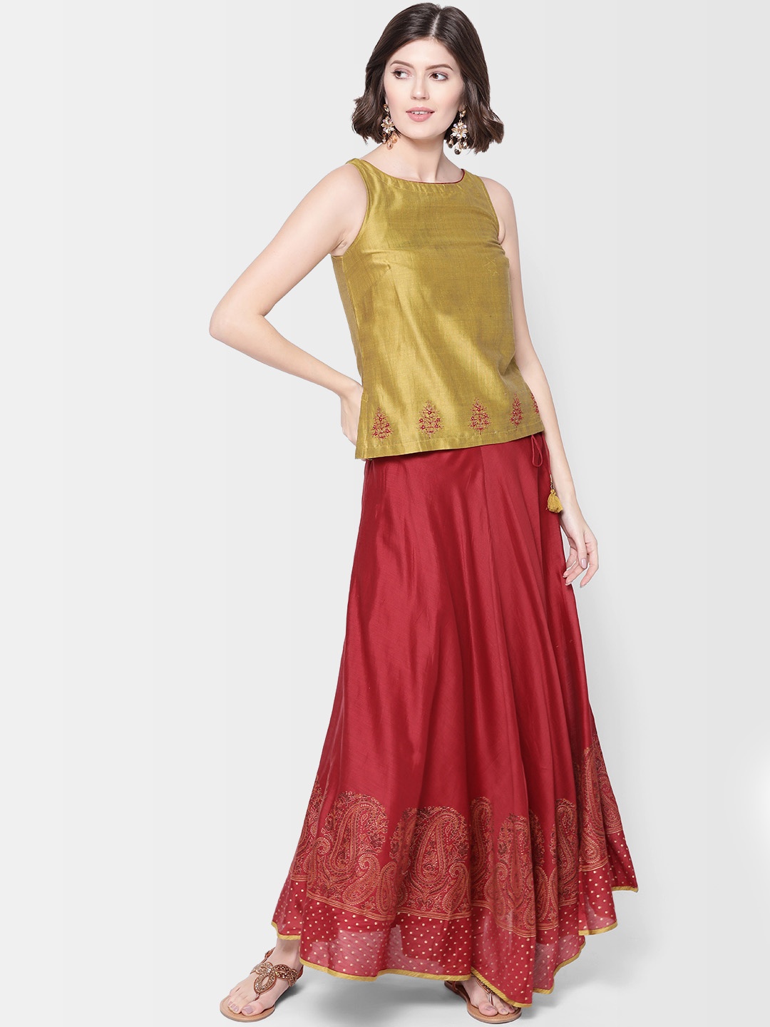 

Fabindia Women Green & Red Solid Top with Skirt