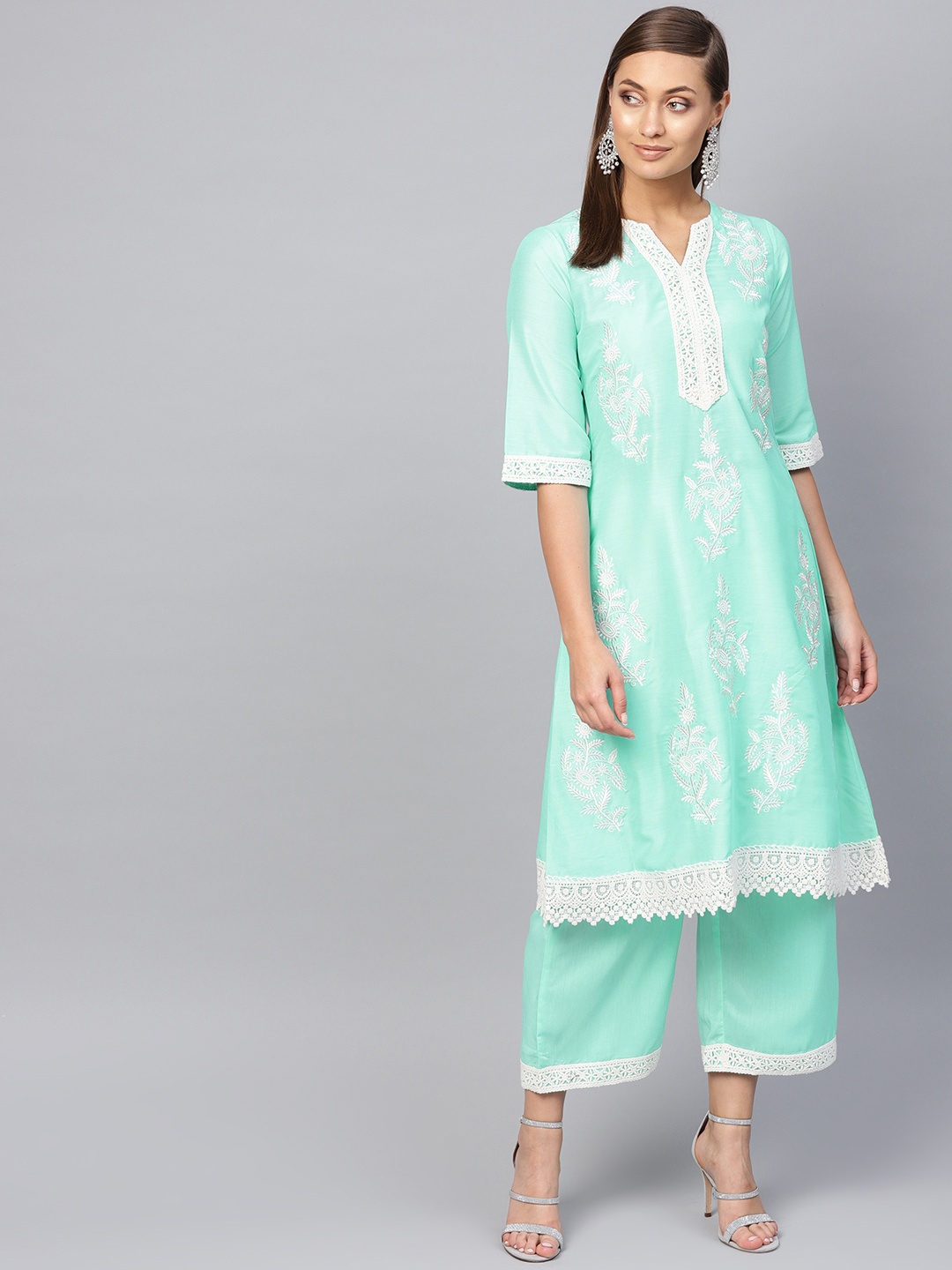 

Libas Women Sea Green & Off-White Embroidered Kurta with Palazzos