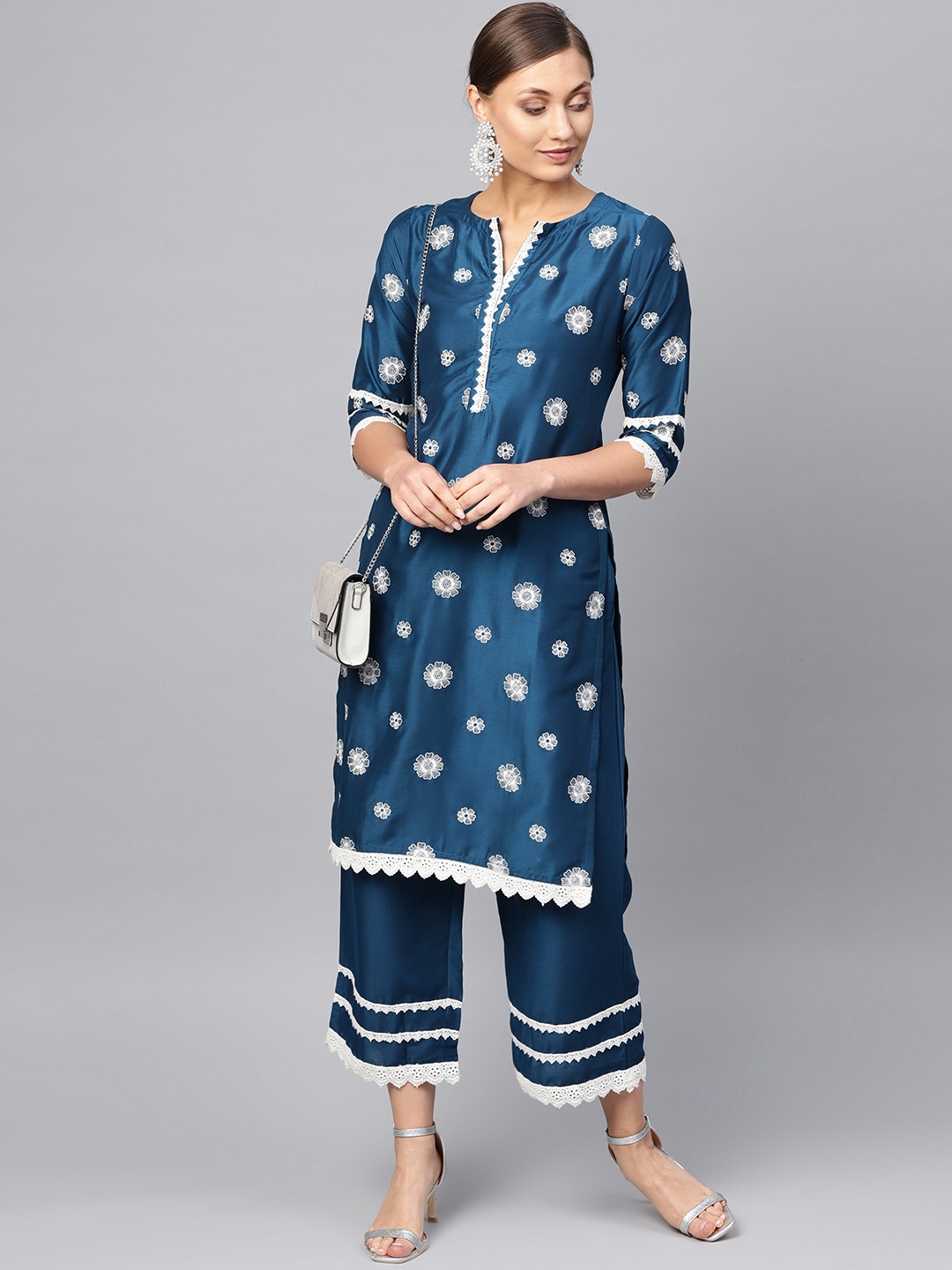 

Libas Women Teal Blue & White Embroidered Kurta with Palazzos