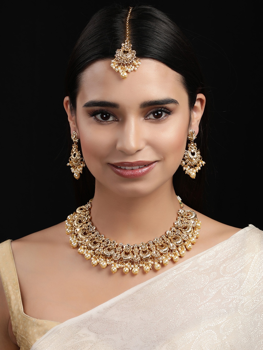 

Rubans Women Gold-Plated & Off-White Kundan & Pearl Embellished Jewellery Set