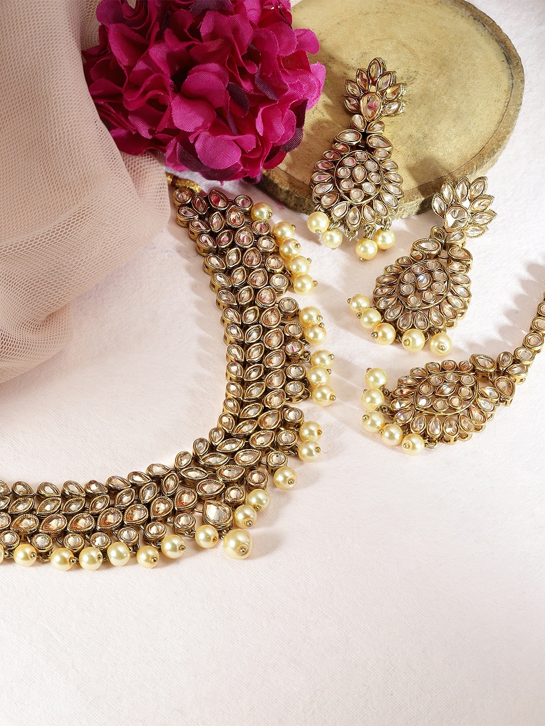 

Rubans Women Gold-Plated & White Kundan & Pearl Embellished Jewellery Set
