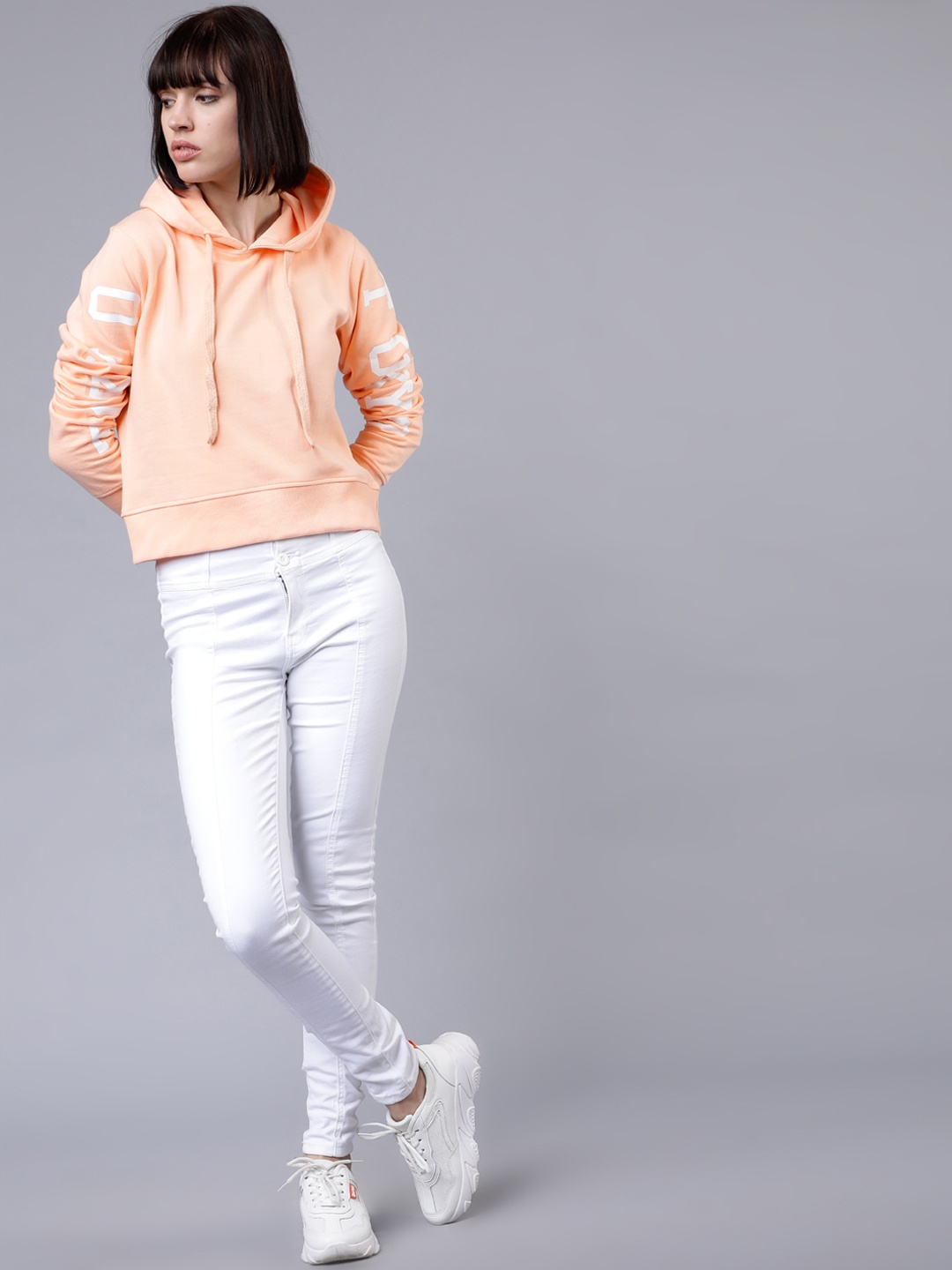 

Tokyo Talkies Women Peach-Coloured Solid Hooded Sweatshirt