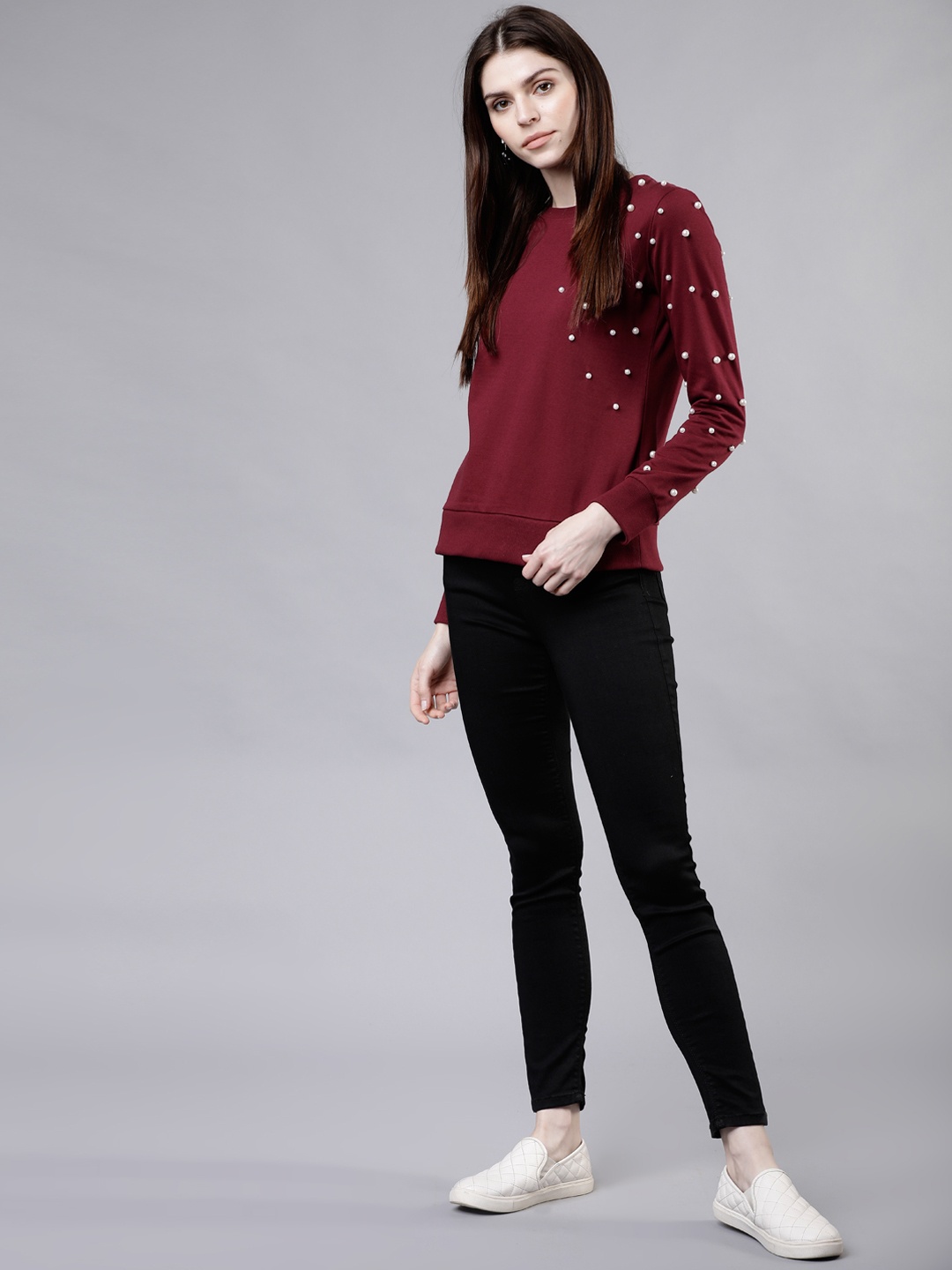 

Tokyo Talkies Women Maroon & White Solid Sweatshirt