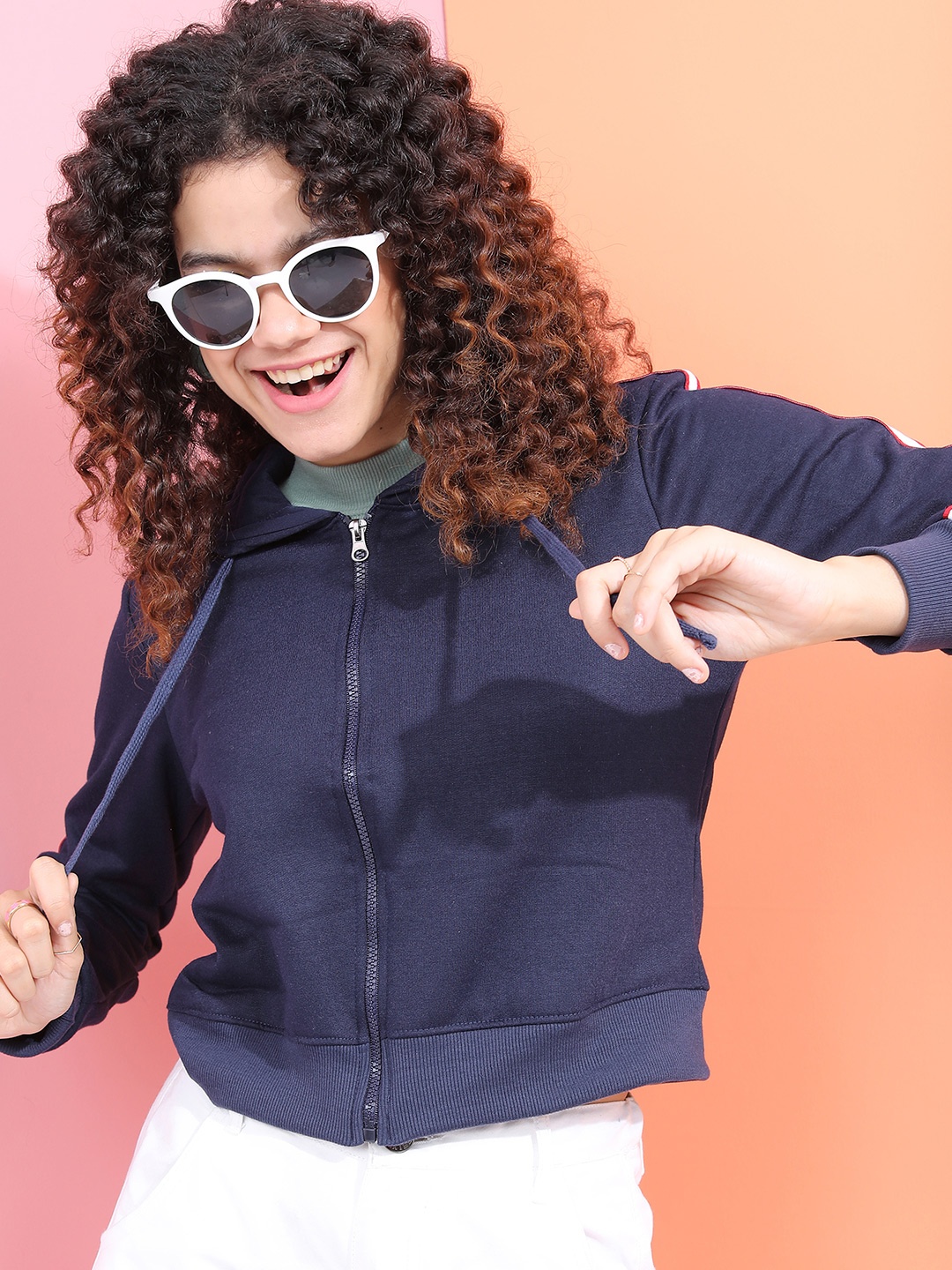 

Tokyo Talkies Women Navy Blue & Red Solid Hooded Sweatshirt