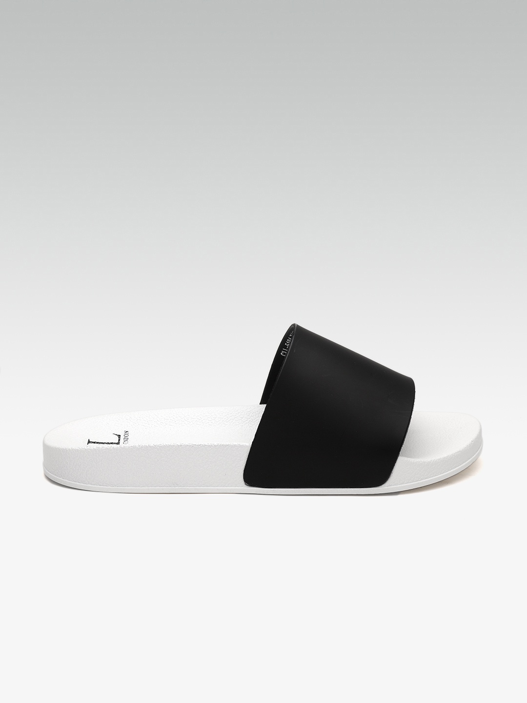 

Carlton London Women Black & White Solid Sliders