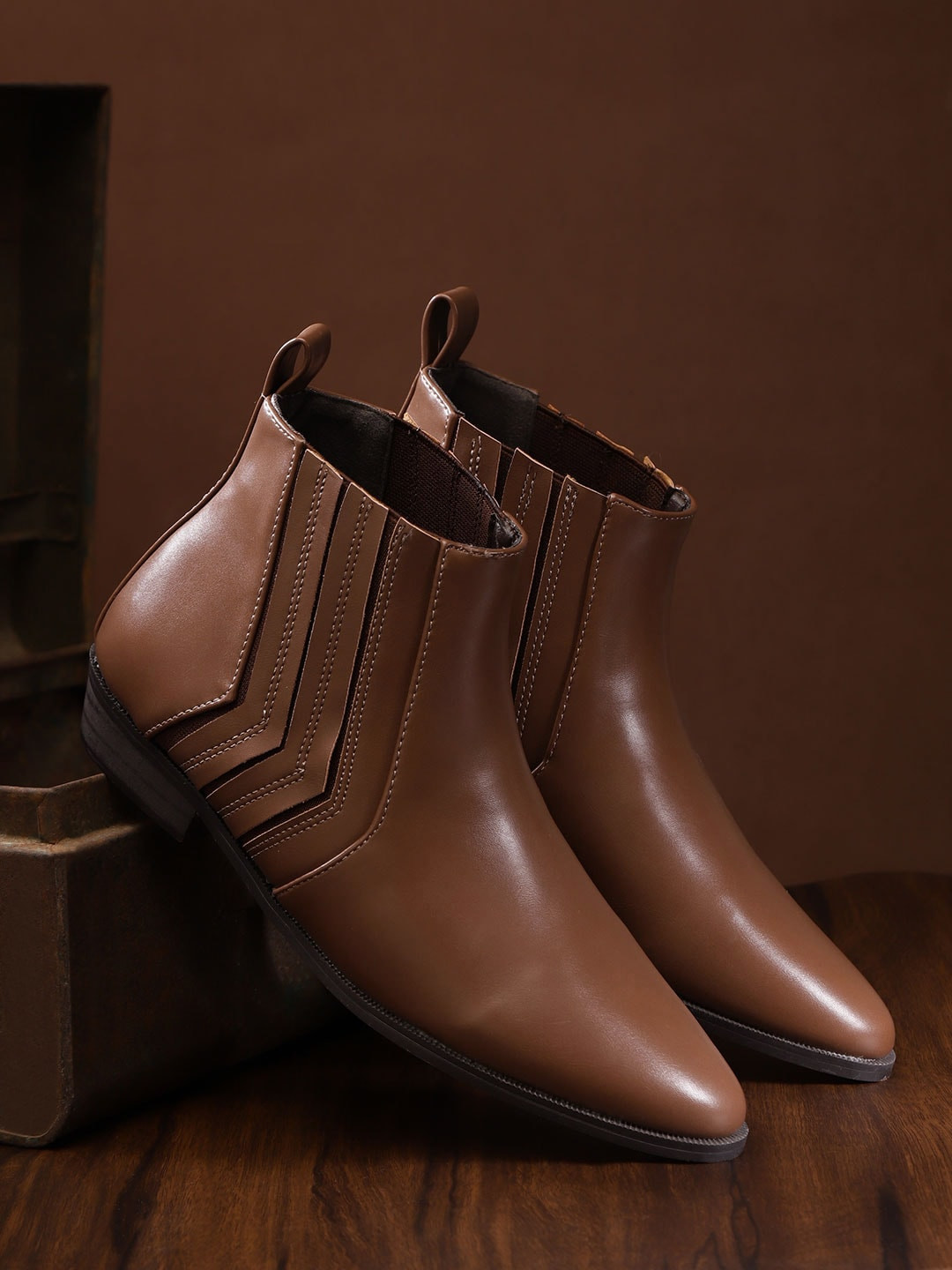 

The Roadster Lifestyle Co Women Brown Solid Mid-Top Chelsea Boots