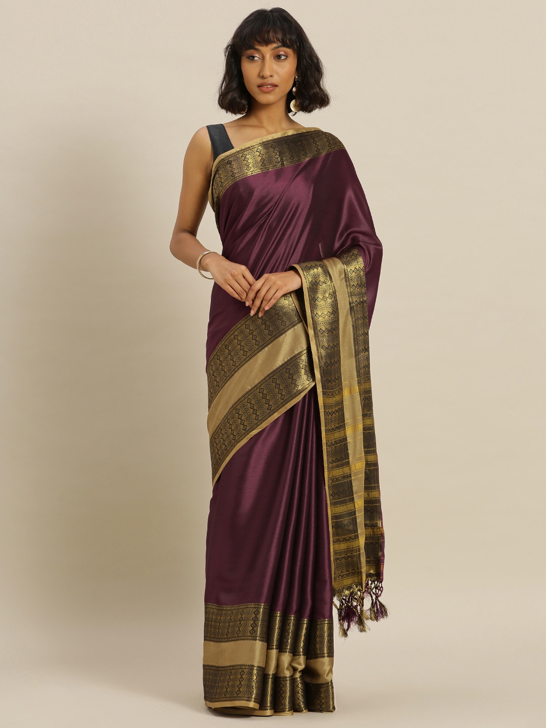 

Mitera Purple Solid Poly Silk Saree