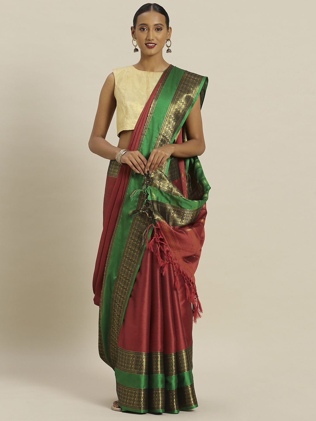 

Mitera Maroon & Green Poly Silk Solid Saree