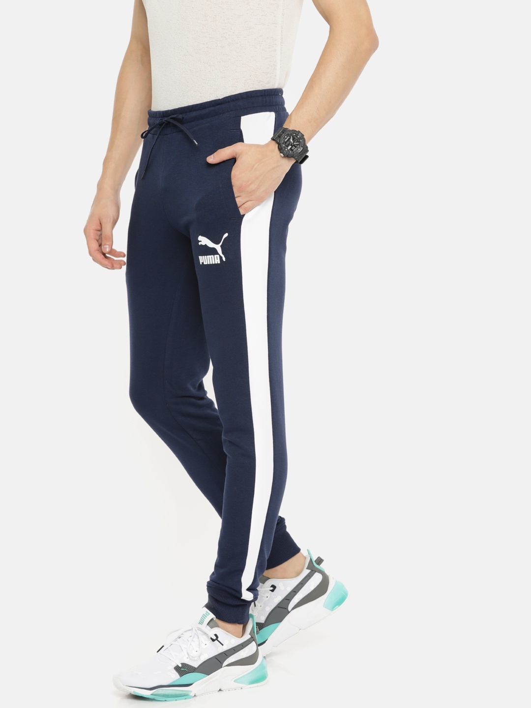 

Puma Men Navy Blue Solid Straight Fit Iconic T7 Track Sustainable Joggers