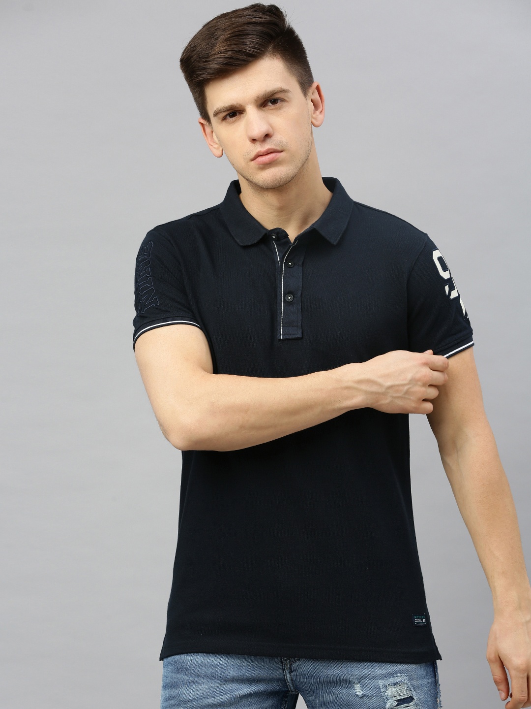 

SPYKAR Men Navy Blue Solid Polo Collar T-shirt with Applique Detail