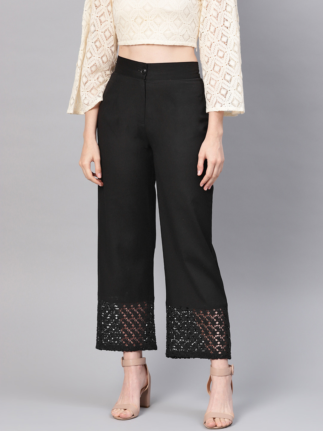

Juniper Women Black Solid Straight Palazzos