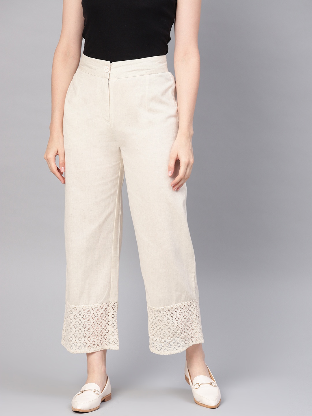 

Juniper Women Off-White Solid Straight Palazzos