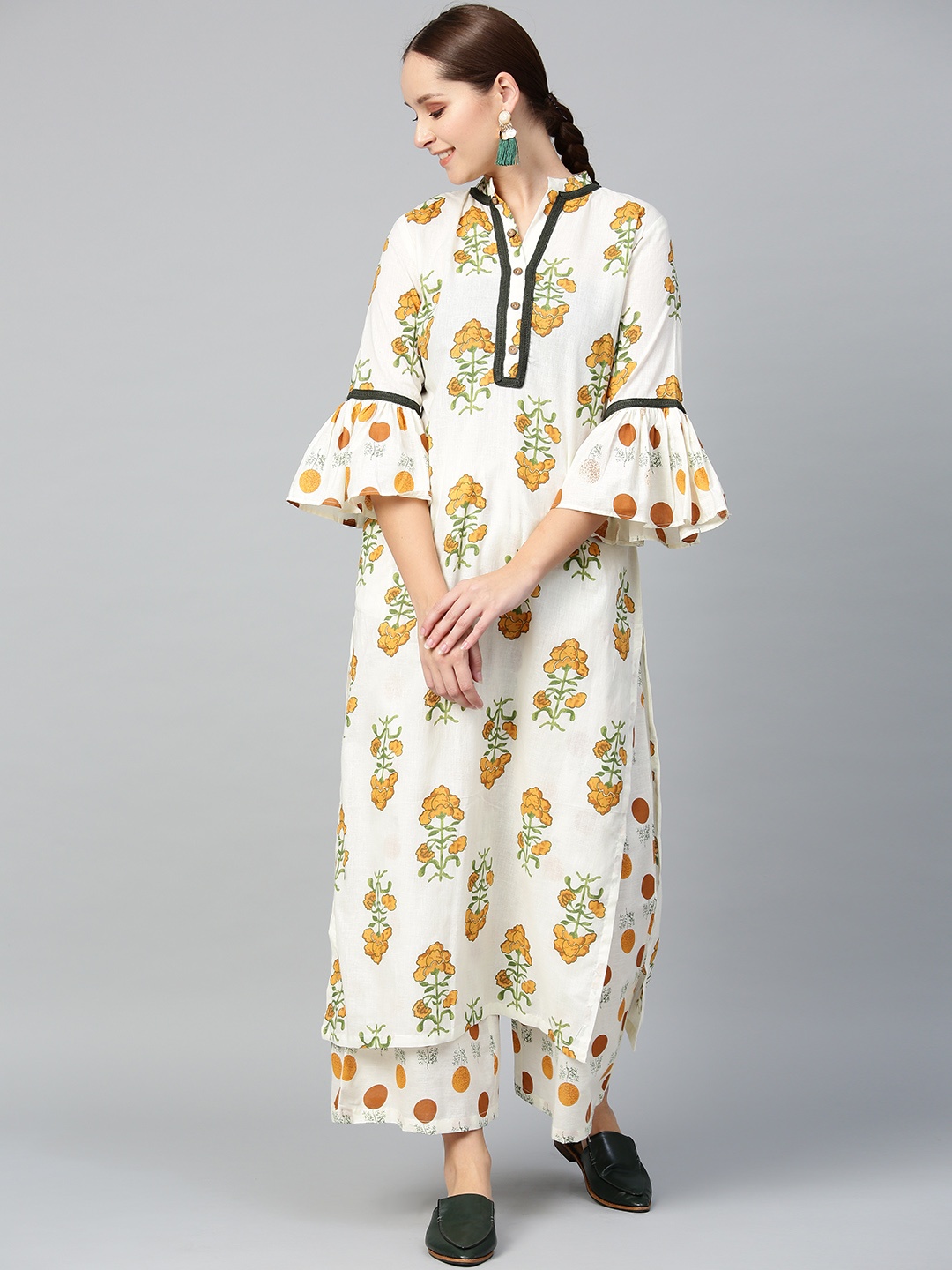 

Tulsattva Women Off-White & Mustard Yellow Printed Kurta with Palazzos