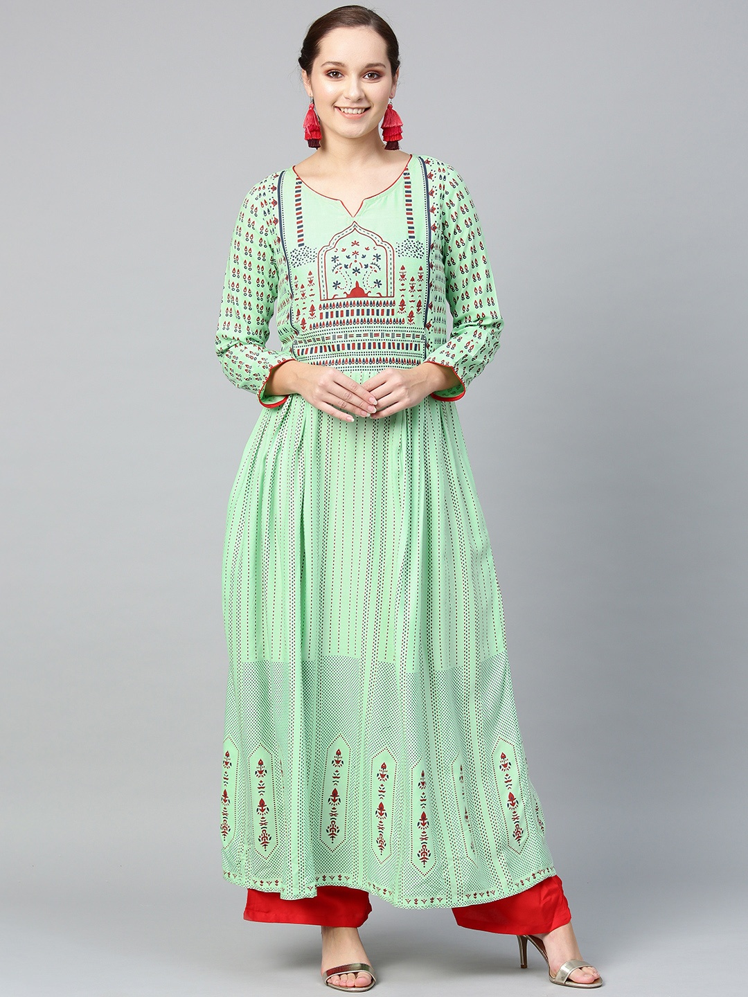 

Tulsattva Women Green & Red Printed Kurta with Palazzos