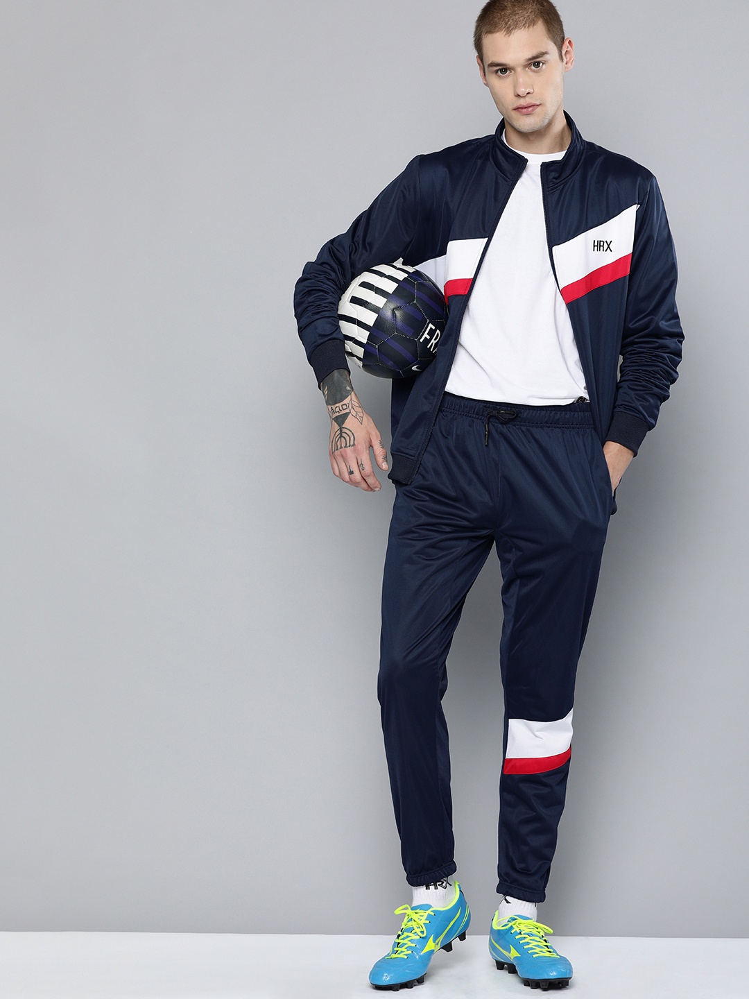 

HRX by Hrithik Roshan Men Navy Blue & White Colourblocked Football Tracksuits