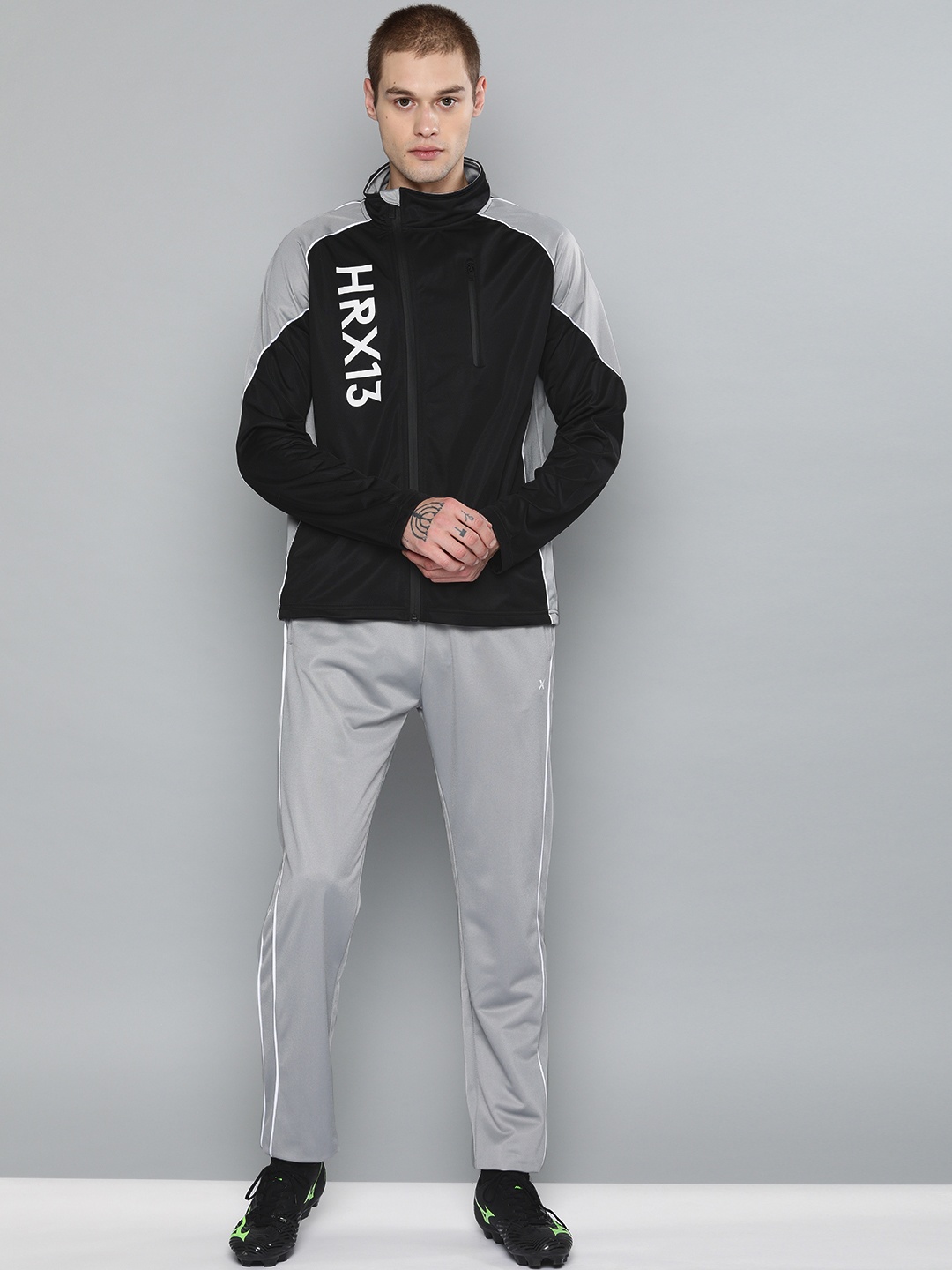 

HRX by Hrithik Roshan Men Black & Grey Solid Football Tracksuit