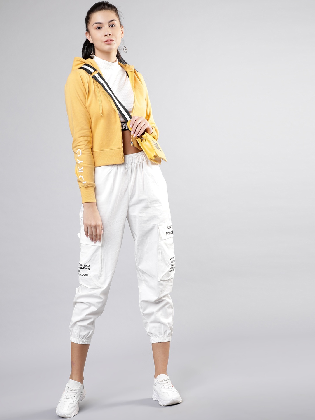 

Tokyo Talkies Women Mustard Solid Hooded Sweatshirt