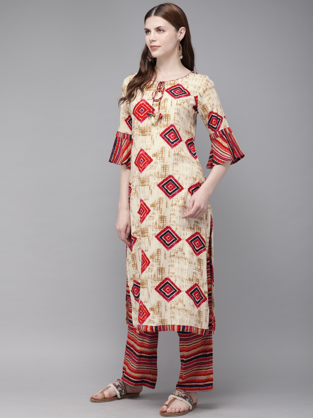 

Alena Women Beige & Pink Printed Kurta with Palazzos