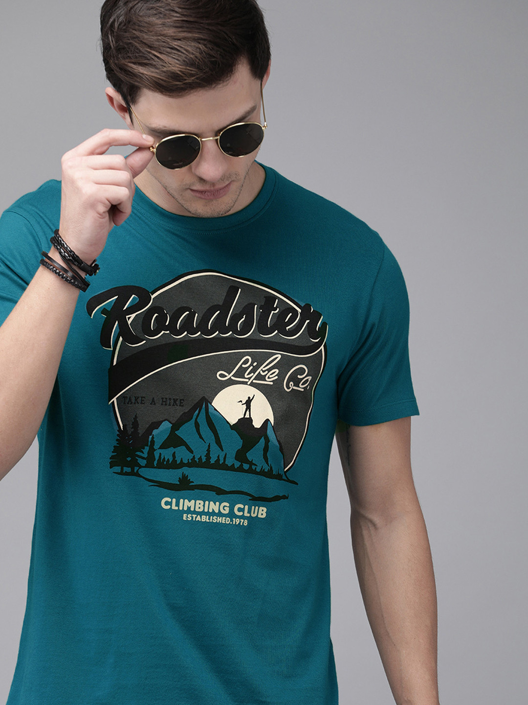 

The Roadster Lifestyle Co Men Teal Blue Printed Round Neck Pure Cotton T-shirt