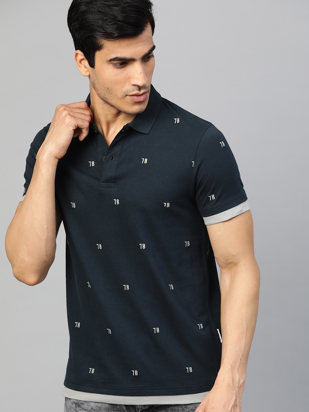 

The Roadster Lifestyle Co Men Navy Blue & White Embroidered Polo Collar T-shirt