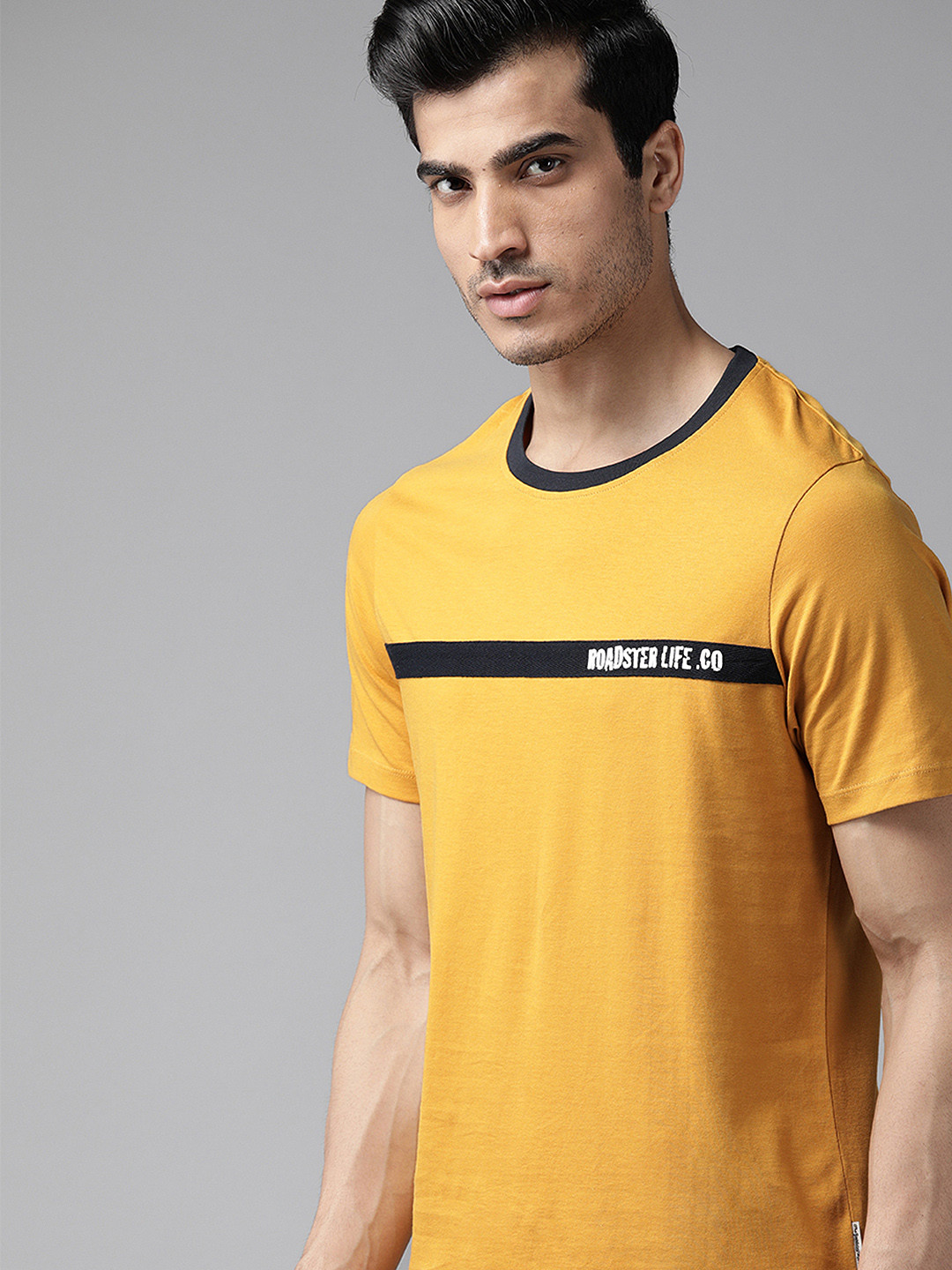 

The Roadster Lifestyle Co Men Mustard Yellow Solid Round Neck Taped T-shirt