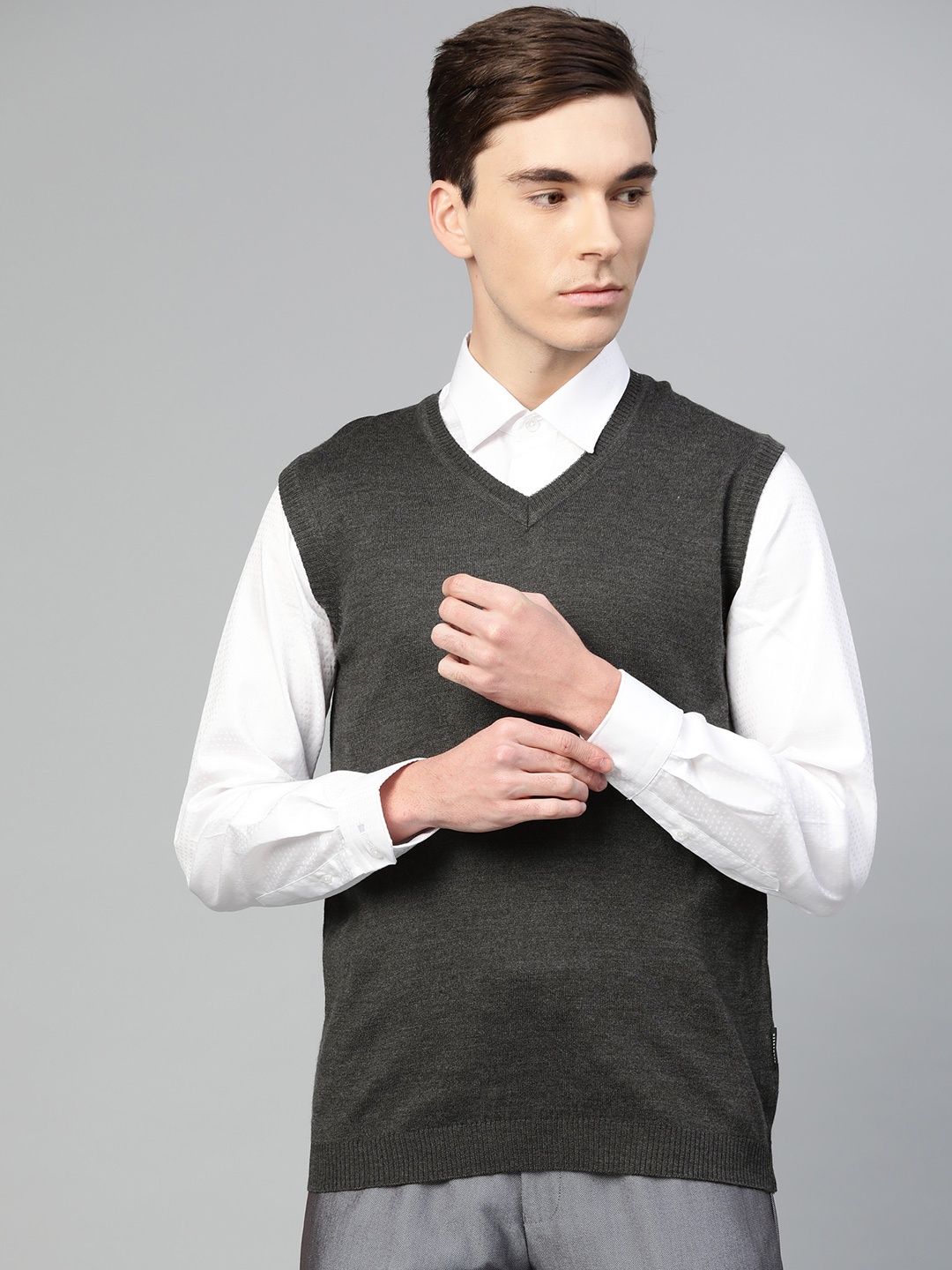 

Van Heusen Men Charcoal Grey Solid Sweater Vest