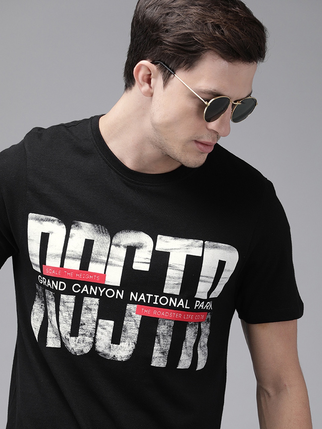 

The Roadster Lifestyle Co Men Black Printed Round Neck Pure Cotton T-shirt