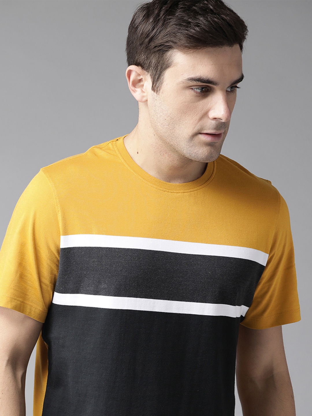 

The Roadster Lifestyle Co Men Mustard Yellow Black Colourblocked Round Neck Pure Cotton T-shirt