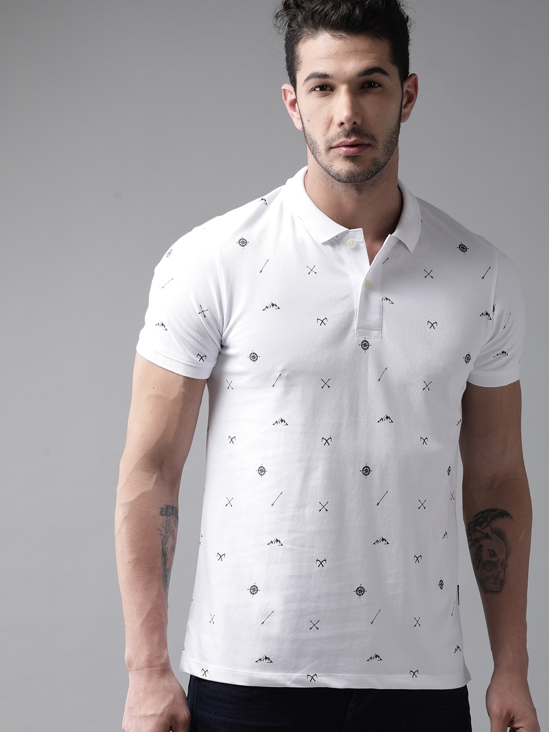 

The Roadster Lifestyle Co Men White & Black All Over Printed Polo Collar T-shirt