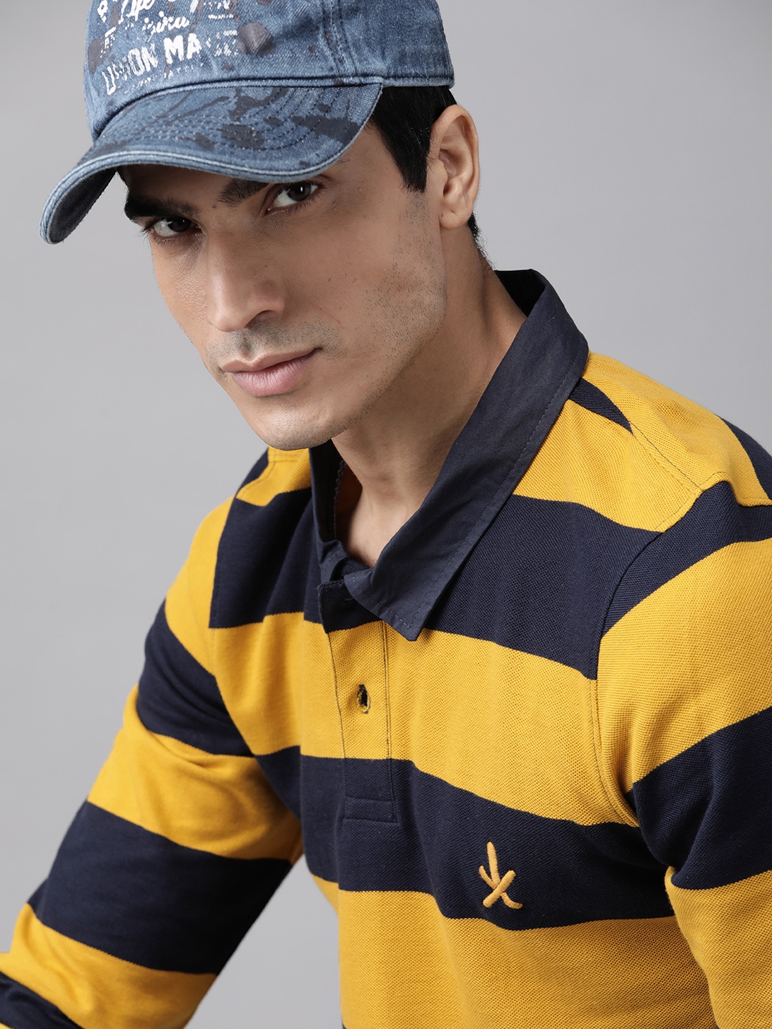 

The Roadster Lifestyle Co Men Yellow & Navy Blue Striped Cotton Polo Collar T-shirt