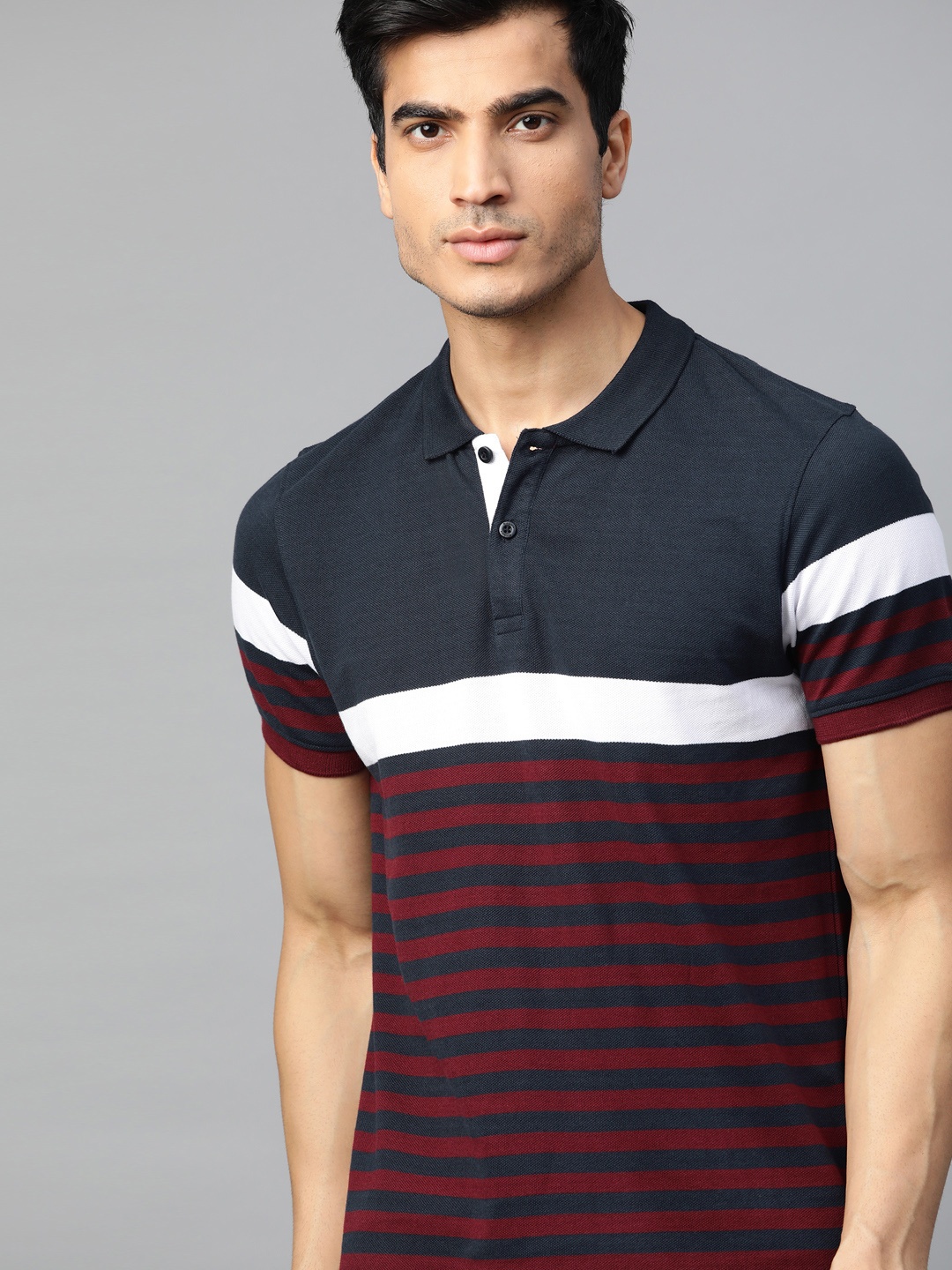 

Roadster Men Navy Blue Maroon Striped Polo Collar Pure Cotton T-shirt